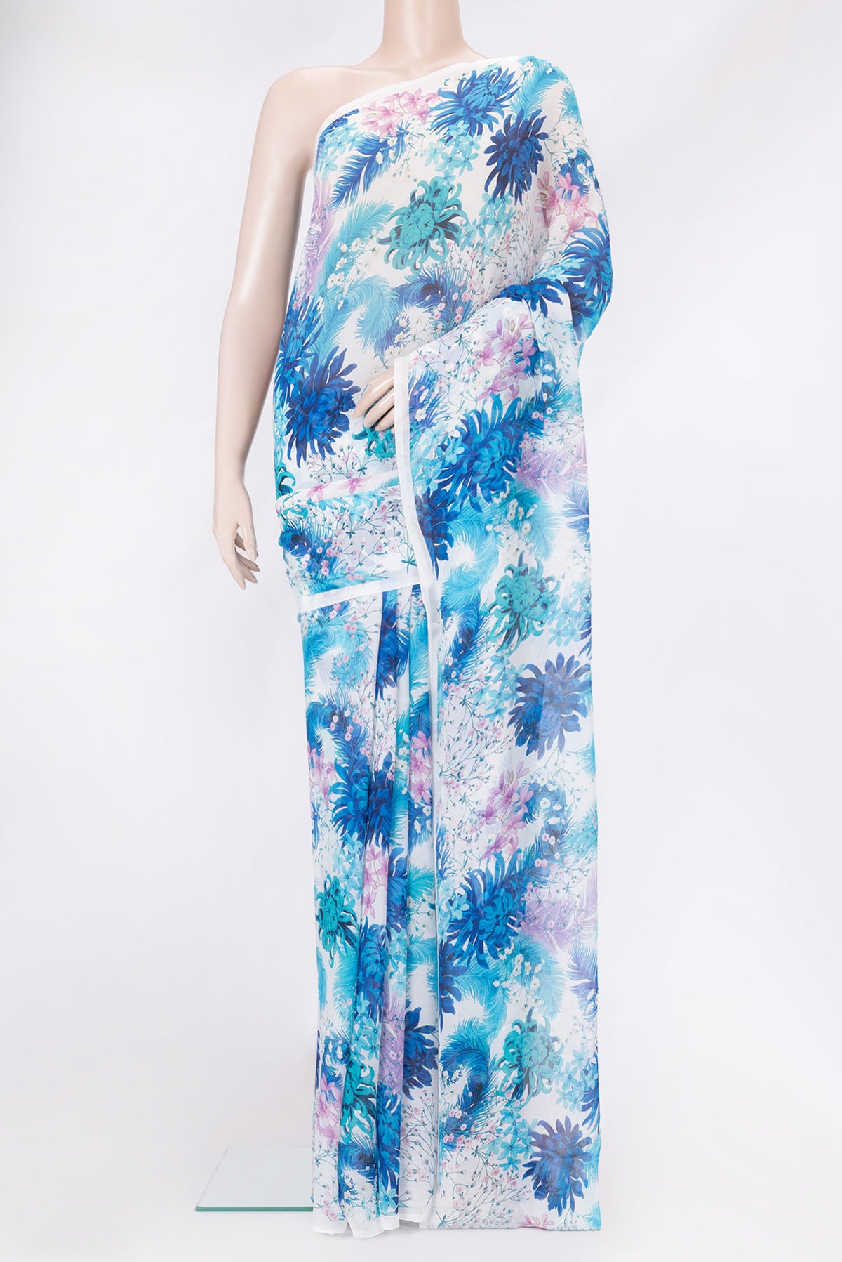 White Mysore Chiffon Saree with Printed design on the body and Plain Border.  displayed on a mannequin
