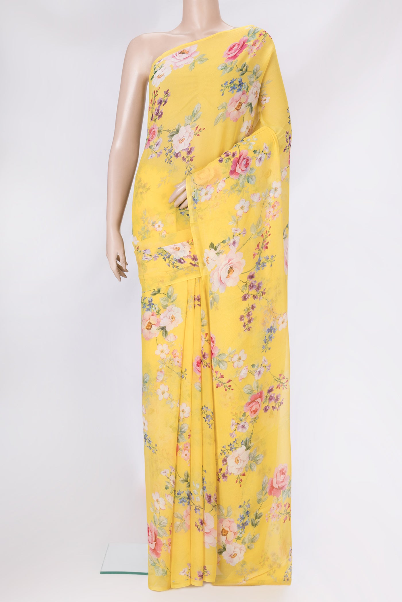 Yellow Mysore Chiffon Saree with Printed design on the body and Without Border.  displayed on a mannequin