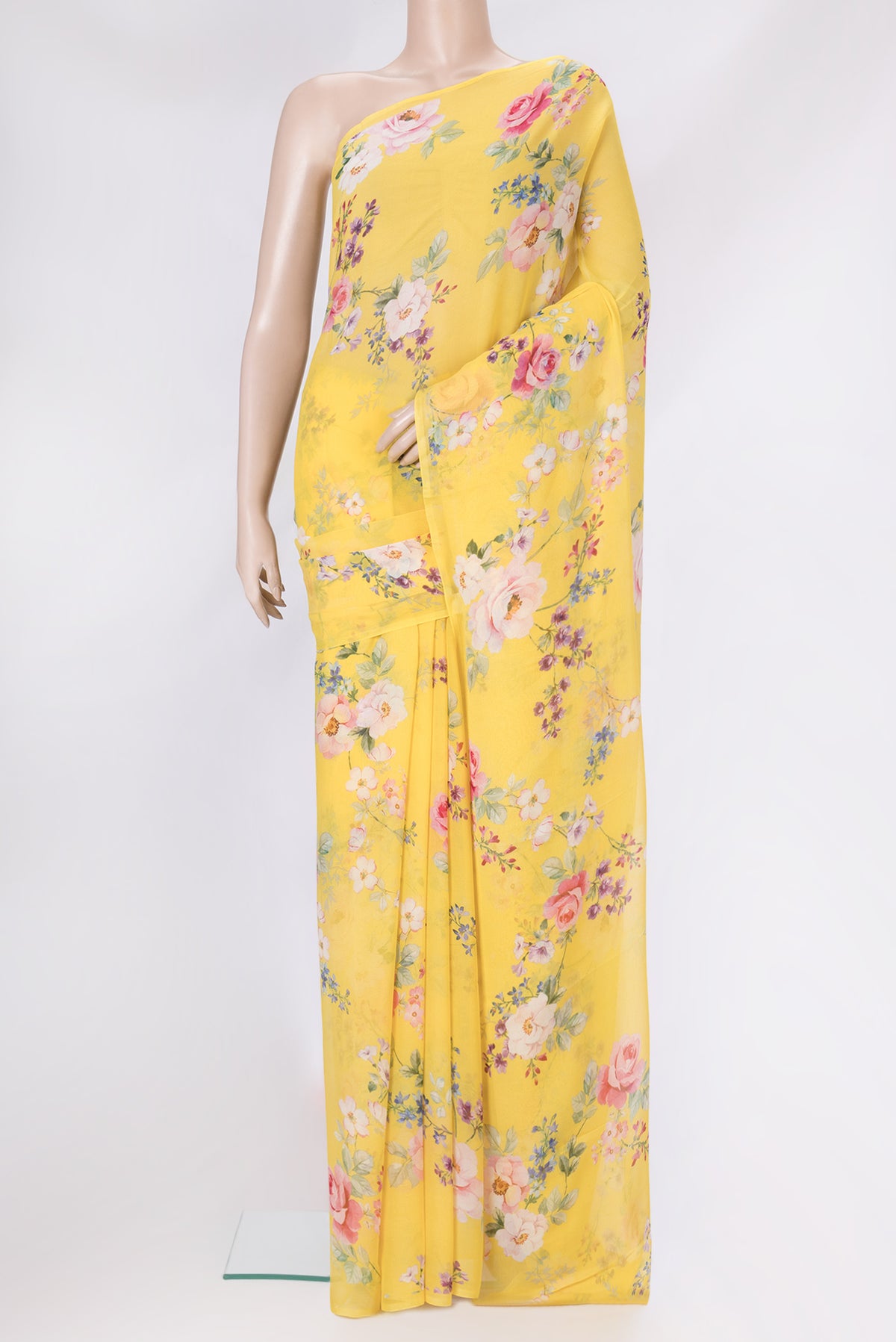 Yellow Mysore Chiffon Saree with Printed design on the body and Without Border.  displayed on a mannequin