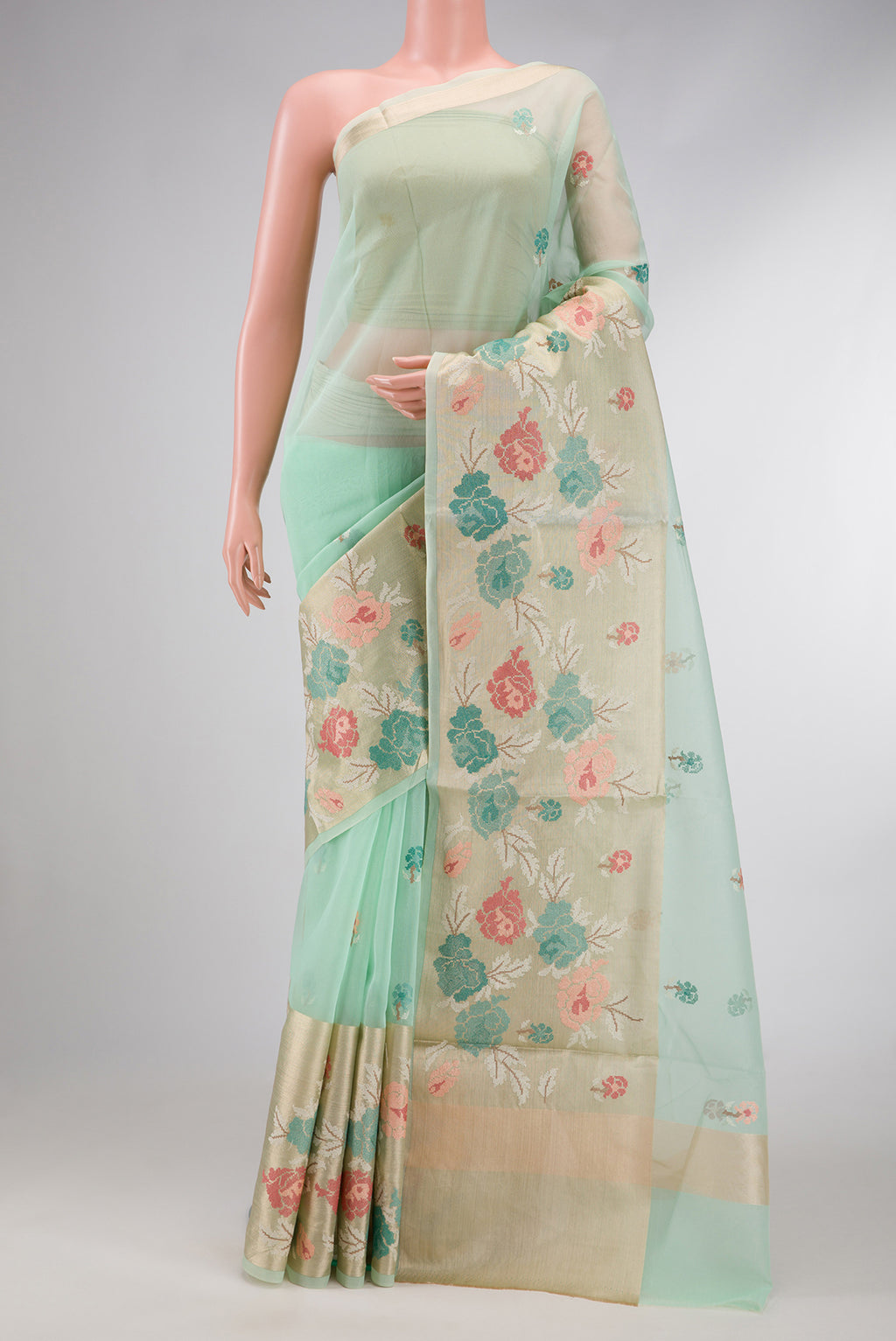 Sea Green Dual Tone Organza Silk Saree with Embroidery on the body and Fancy Border.  displayed on a mannequin