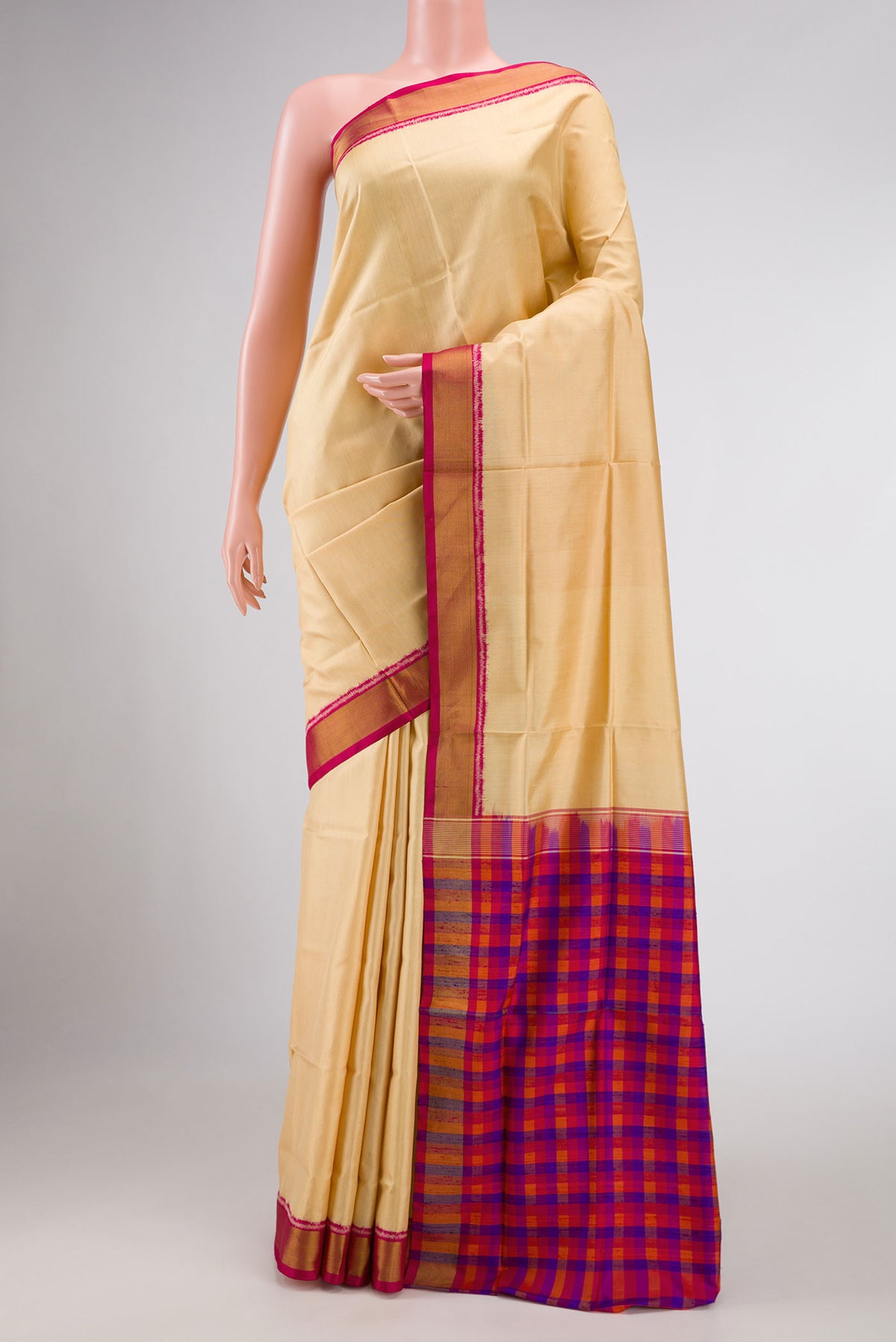 Sandal Dual Tone Rajkot Patola Silk Saree with Plain Body and Zari Border displayed on a mannequin