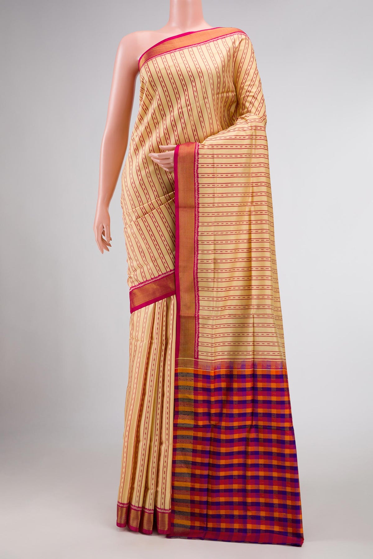 Sandal Dual Tone Rajkot Patola Silk Saree with Ikat Print on the body and Zari Border displayed on a mannequin