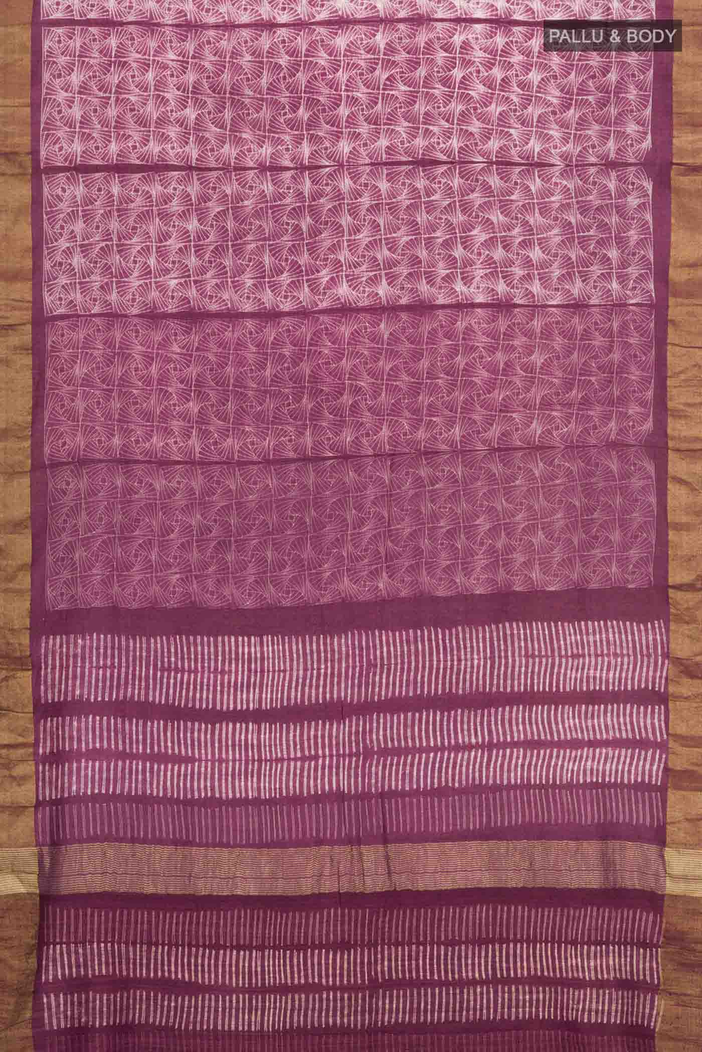 Flat view of Mauve Tussar Silk Saree with Printed design on the body and Zari Border