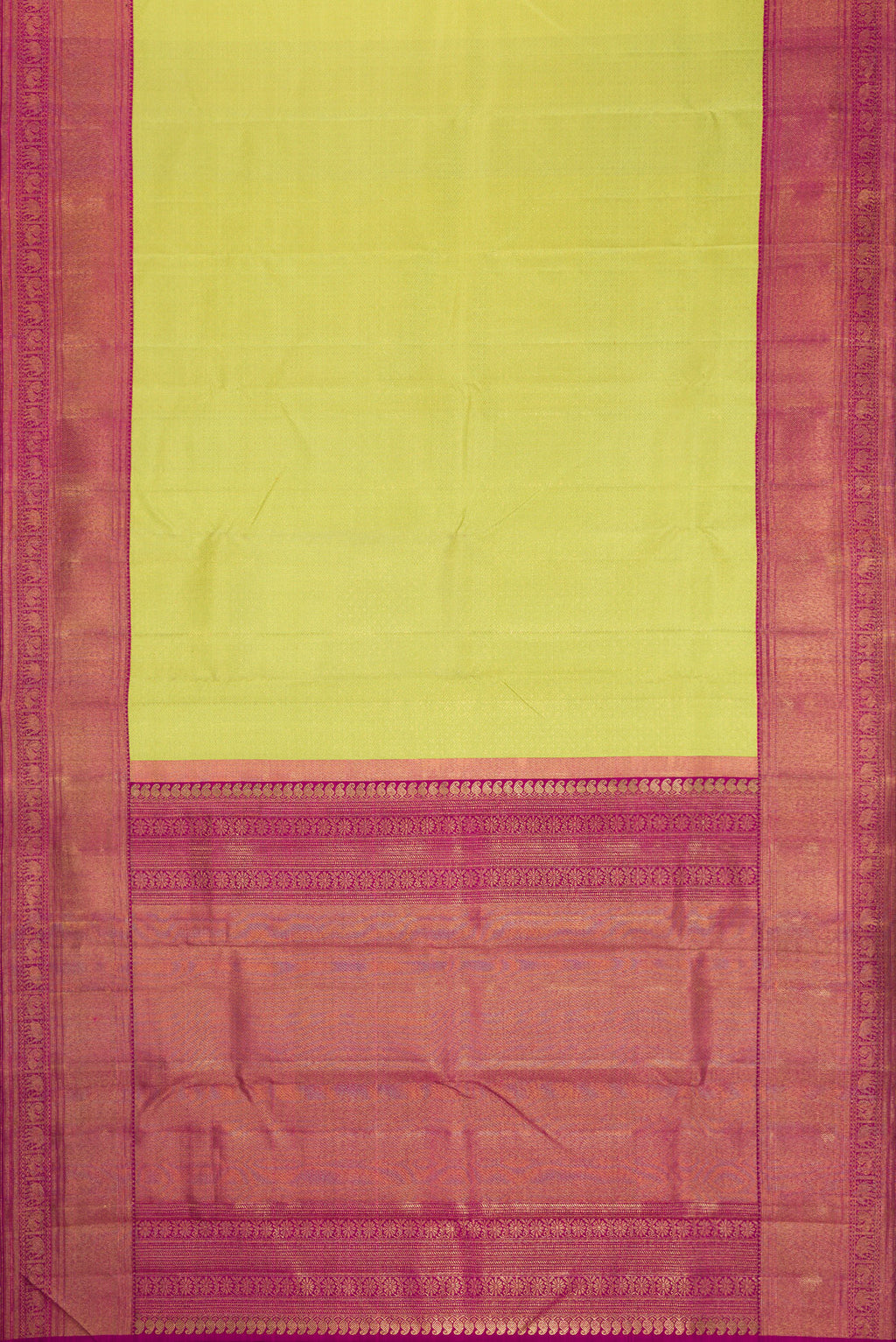 Flat view of Pure Silk Pure Zari Parrot Green Dual Tone Kanjivaram Saree with Zari Brocade on the body and Zari Border. 