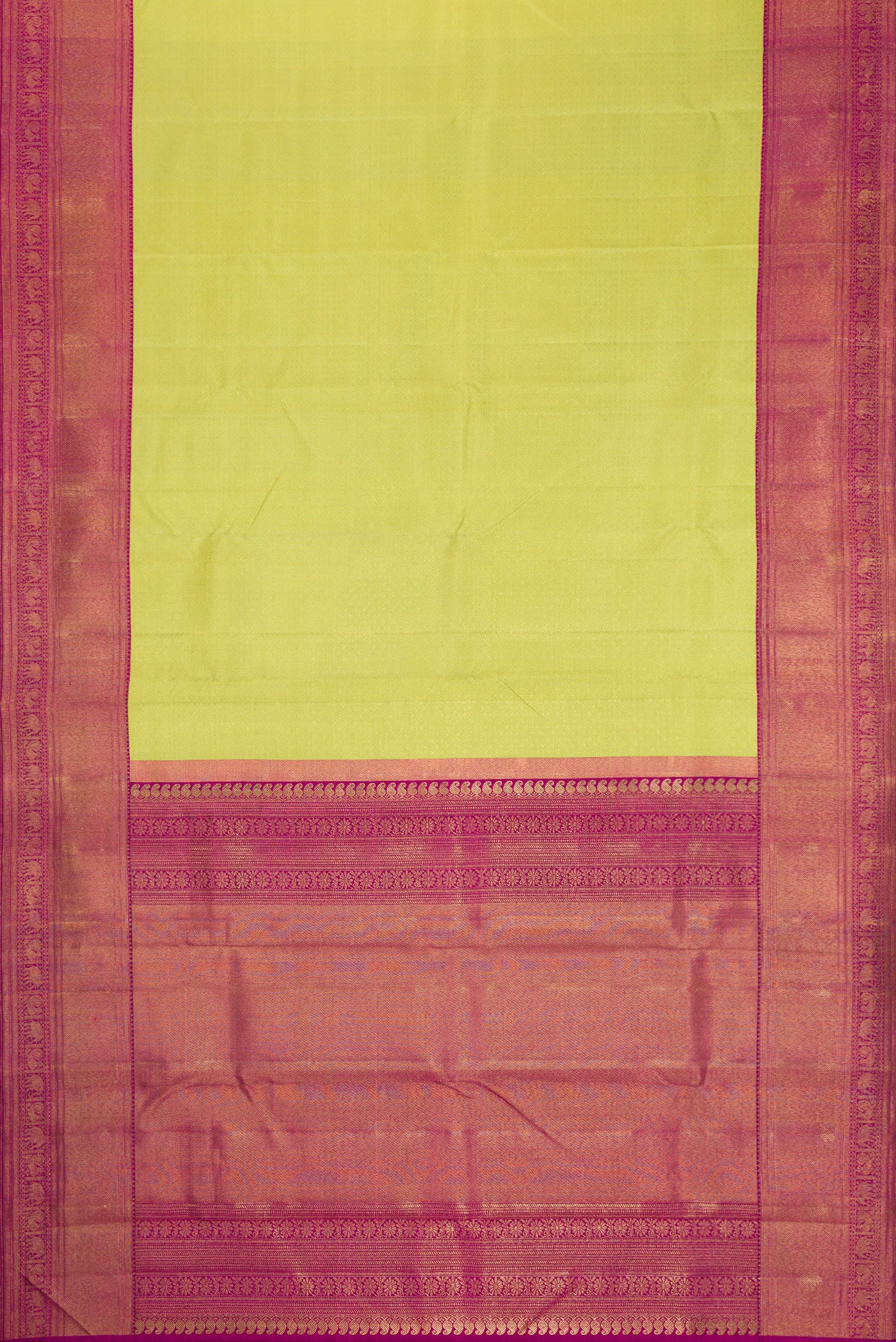 Flat view of Pure Silk Pure Zari Parrot Green Dual Tone Kanjivaram Saree with Zari Brocade on the body and Zari Border. 