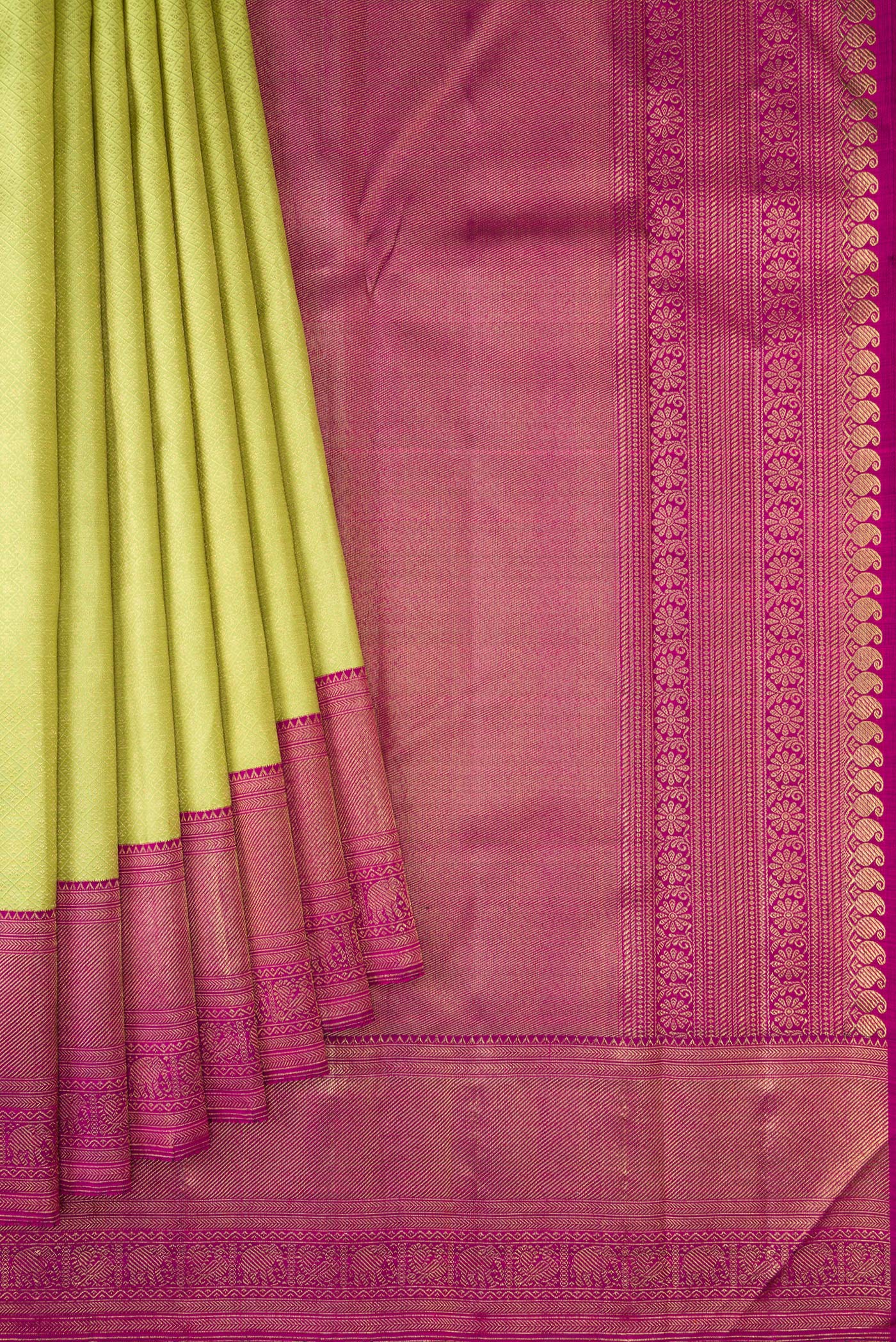 Pleats and pallu of Pure Silk Pure Zari Parrot Green Dual Tone Kanjivaram Saree with Zari Brocade on the body and Zari Border. 