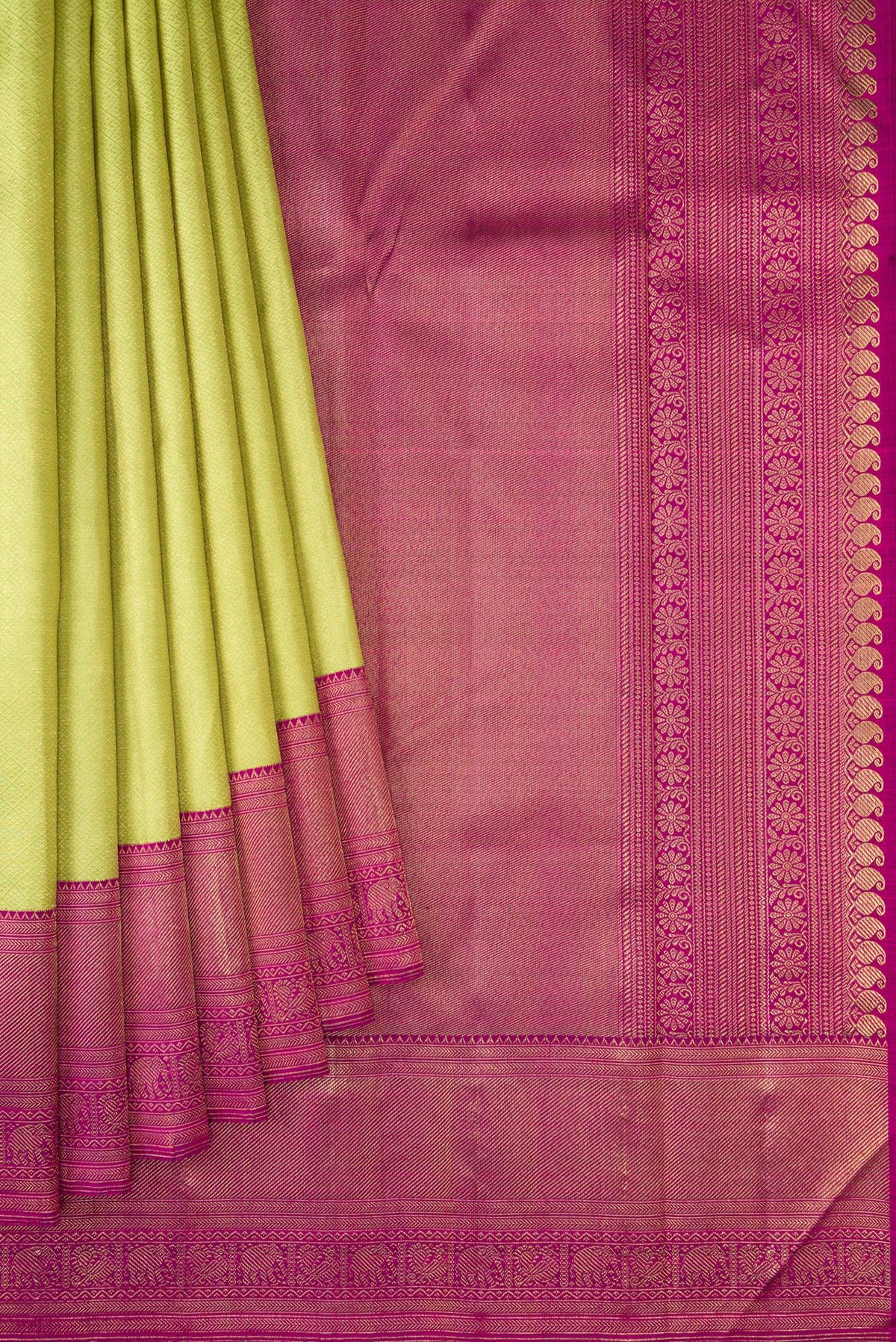 Pleats and pallu of Pure Silk Pure Zari Parrot Green Dual Tone Kanjivaram Saree with Zari Brocade on the body and Zari Border. 
