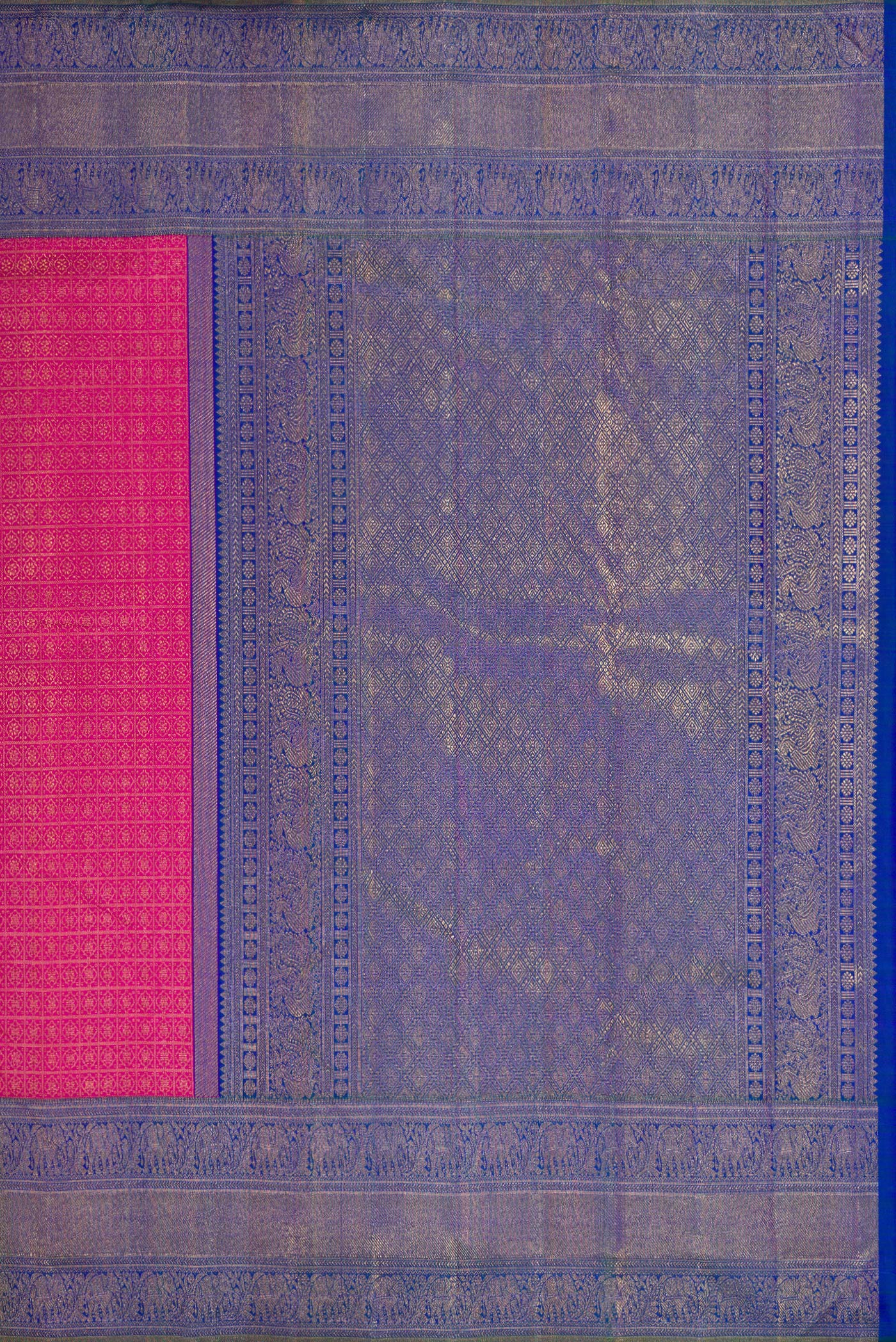 Close up image of the pallu of Dark Pink Dual Tone Kanjivaram Silk Saree with Zari Brocade on the body and Zari Border. 