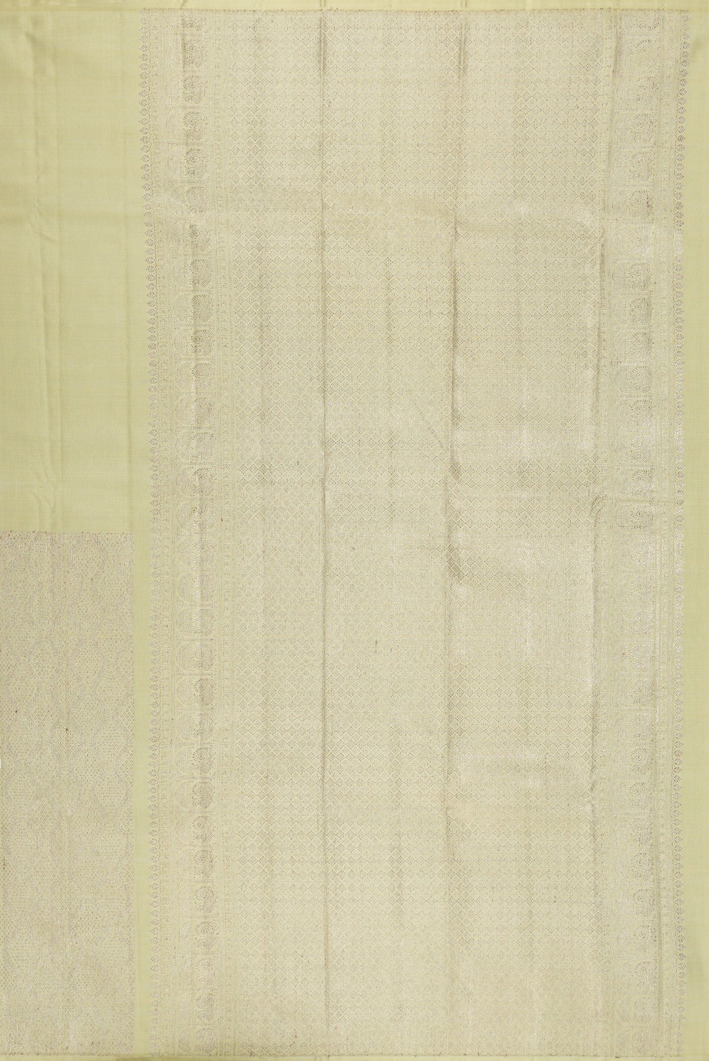 Close up image of the pallu of Pista Green Kanjivaram Silk Saree with Zari Brocade on the body and Without Border. 