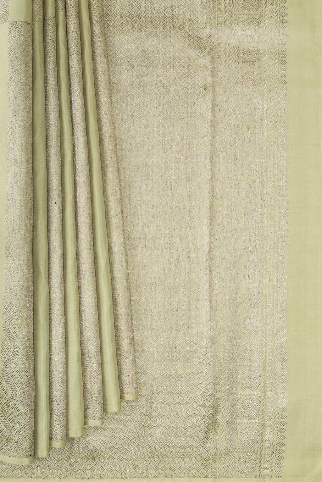 Pleats and pallu of Pista Green Kanjivaram Silk Saree with Zari Brocade on the body and Without Border. 
