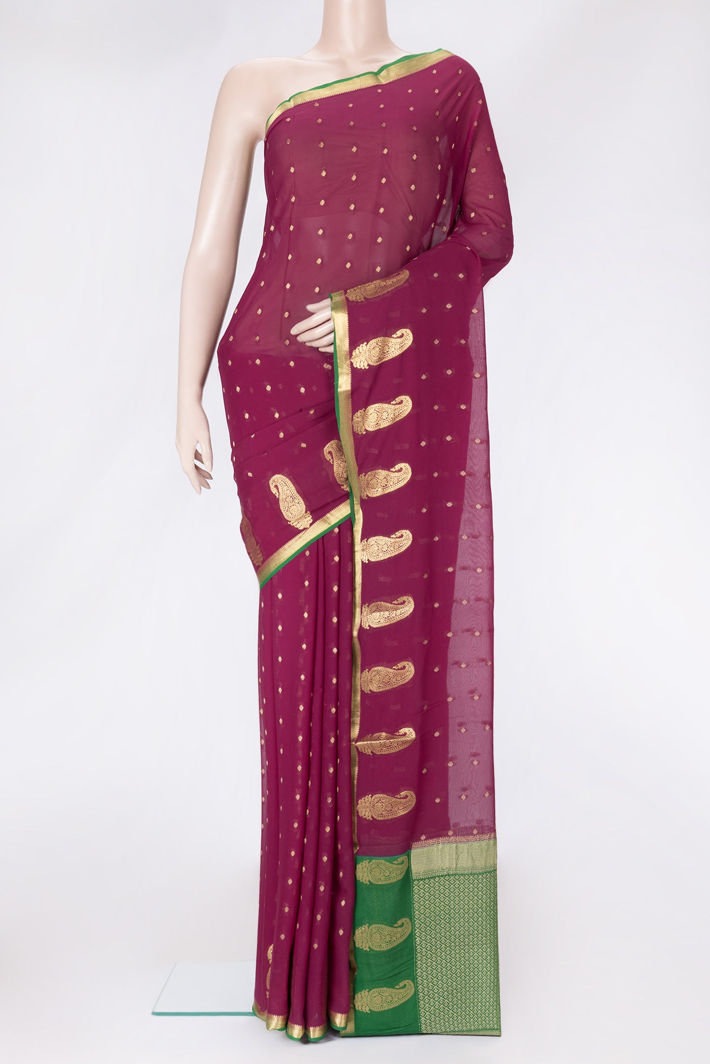 Magenta Dual Tone Mysore Georgette Saree with Zari Butta on the body and Fancy Border.  displayed on a mannequin