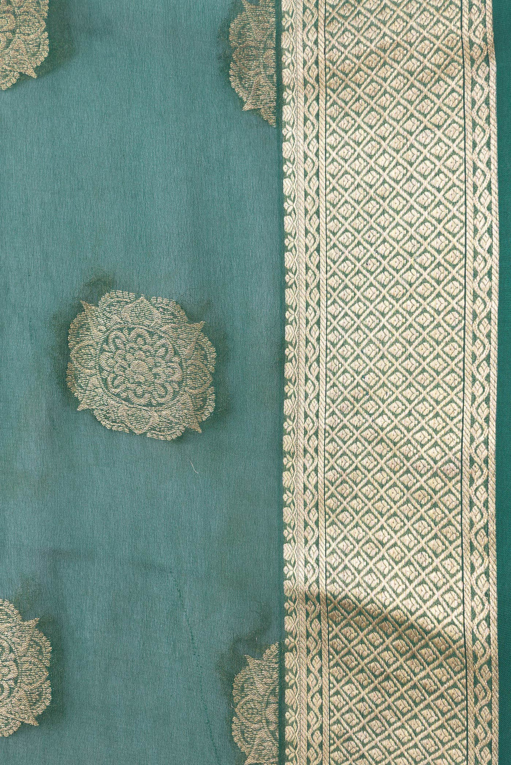 Border image of Bottle Green Dual Tone Mysore Georgette Saree with Zari Butta on the body and Zari Border. 