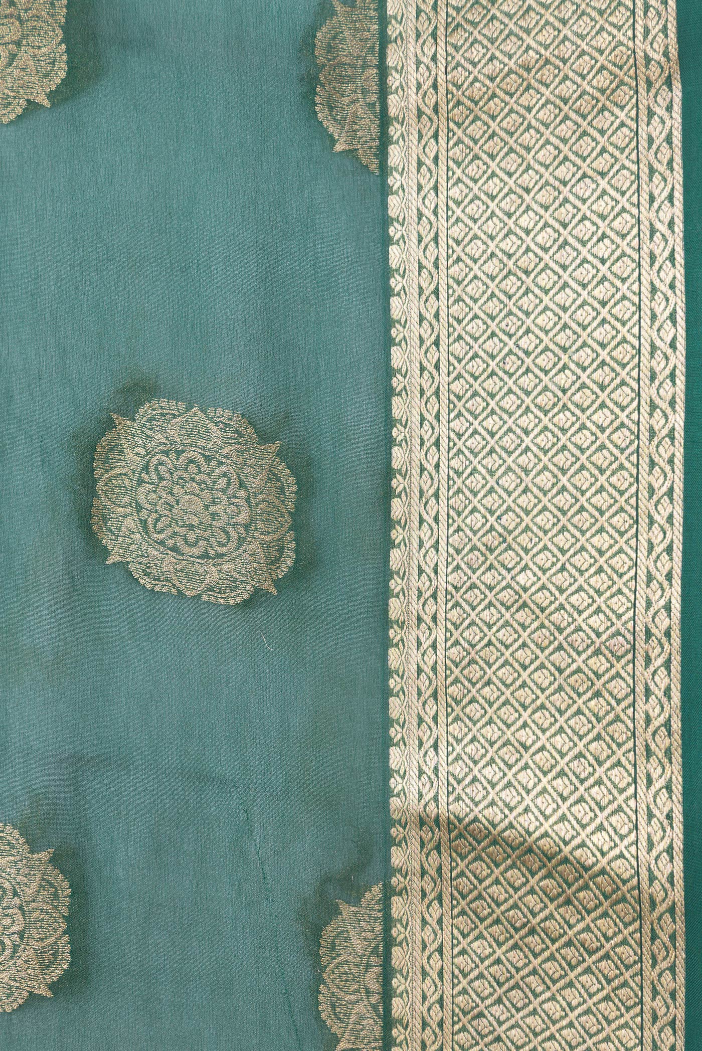 Border image of Bottle Green Dual Tone Mysore Georgette Saree with Zari Butta on the body and Zari Border. 