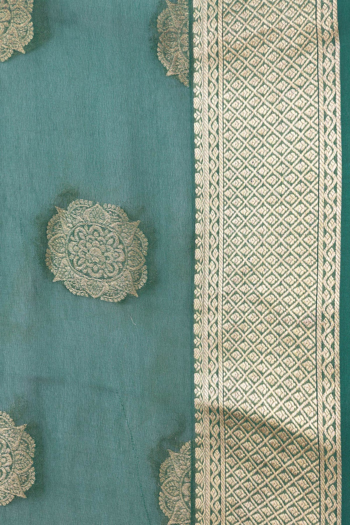 Border image of Bottle Green Dual Tone Mysore Georgette Saree with Zari Butta on the body and Zari Border. 