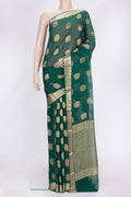 Bottle Green Dual Tone Mysore Georgette Saree with Zari Butta on the body and Zari Border.  displayed on a mannequin