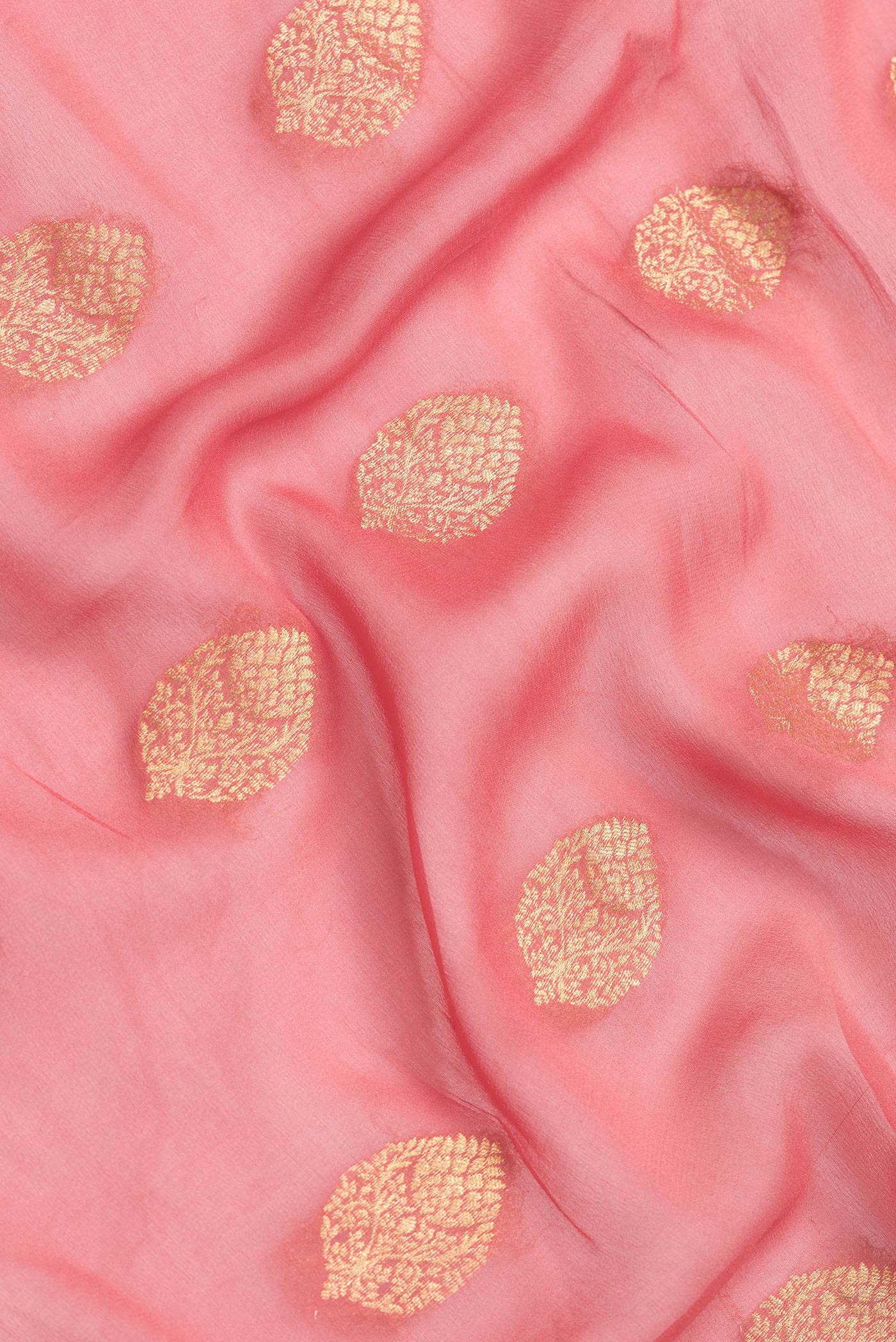 Close up of Pink Dual Tone Mysore Georgette Saree with Zari Butta on the body and Zari Border.  displaying folds