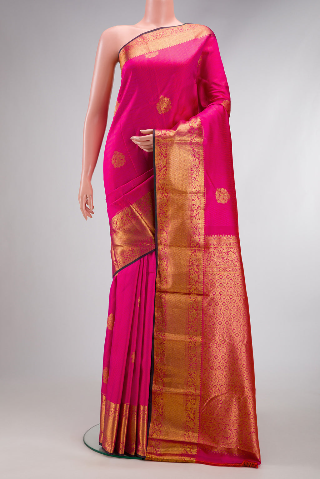Pink Dual Tone Kanchipuram Silk Saree with Jacquard With Zari Butta on the body and Zari Border.  displayed on a mannequin