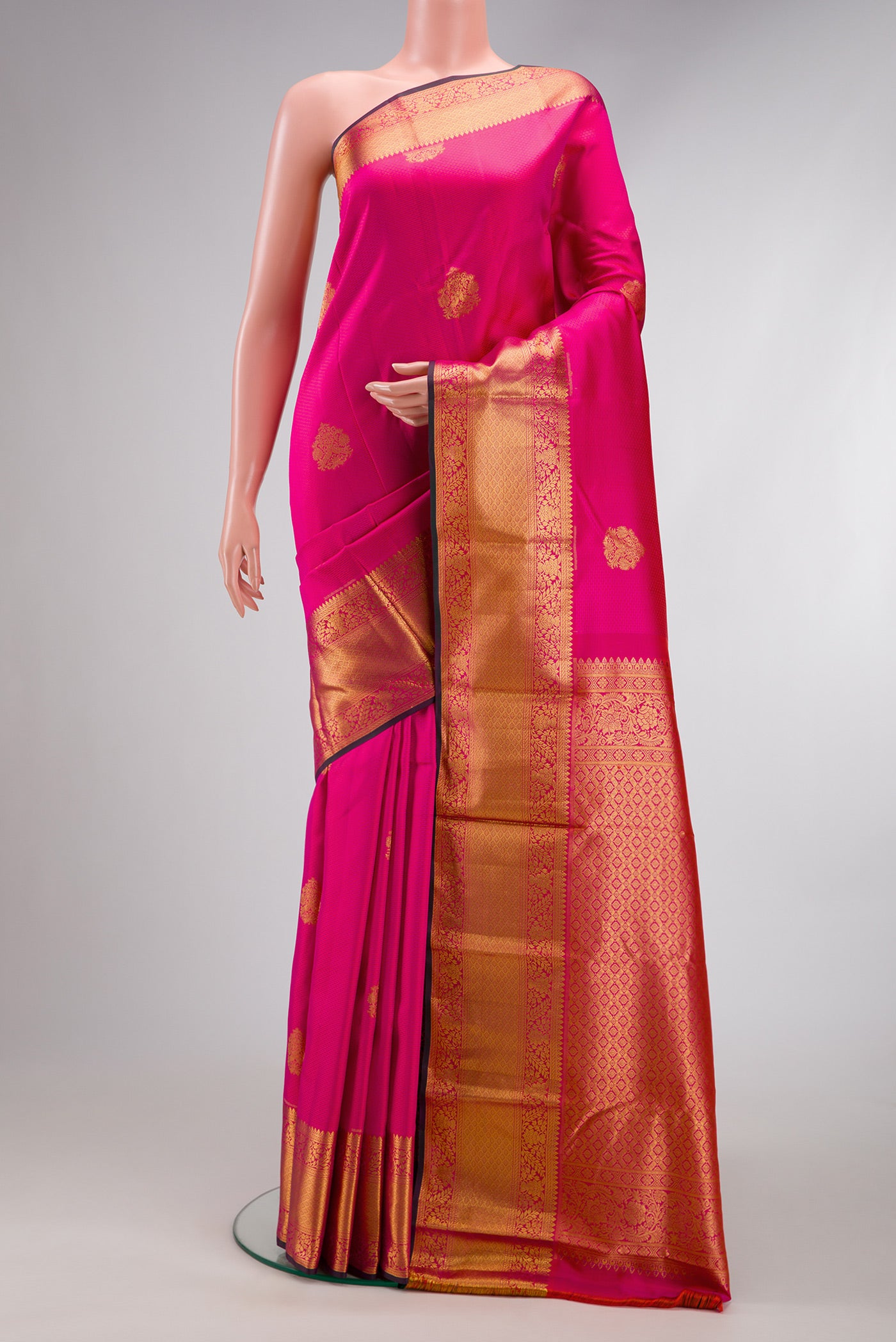 Pink Dual Tone Kanchipuram Silk Saree with Jacquard With Zari Butta on the body and Zari Border.  displayed on a mannequin