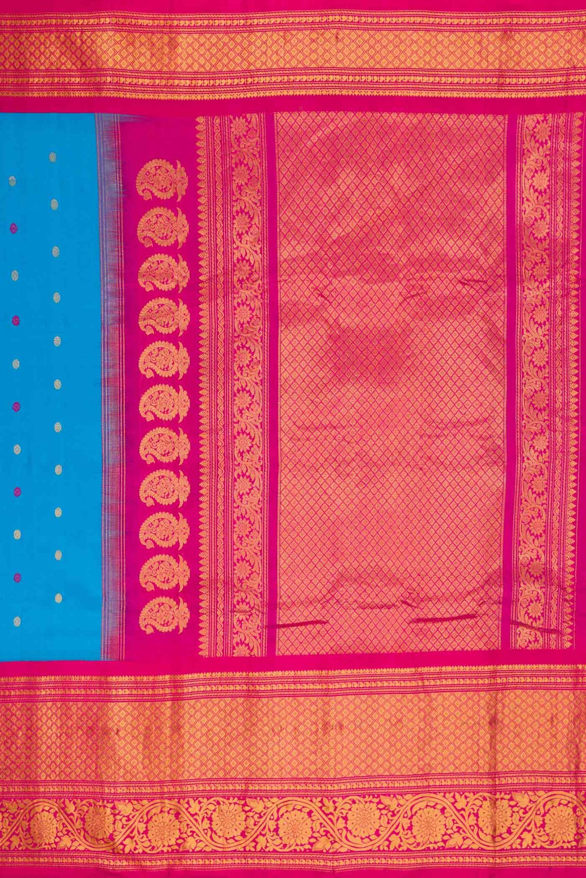 Close up image of the pallu of Sky Blue Dual Tone Gadwal Silk Saree with Zari And Thread Butta on the body and Zari Border