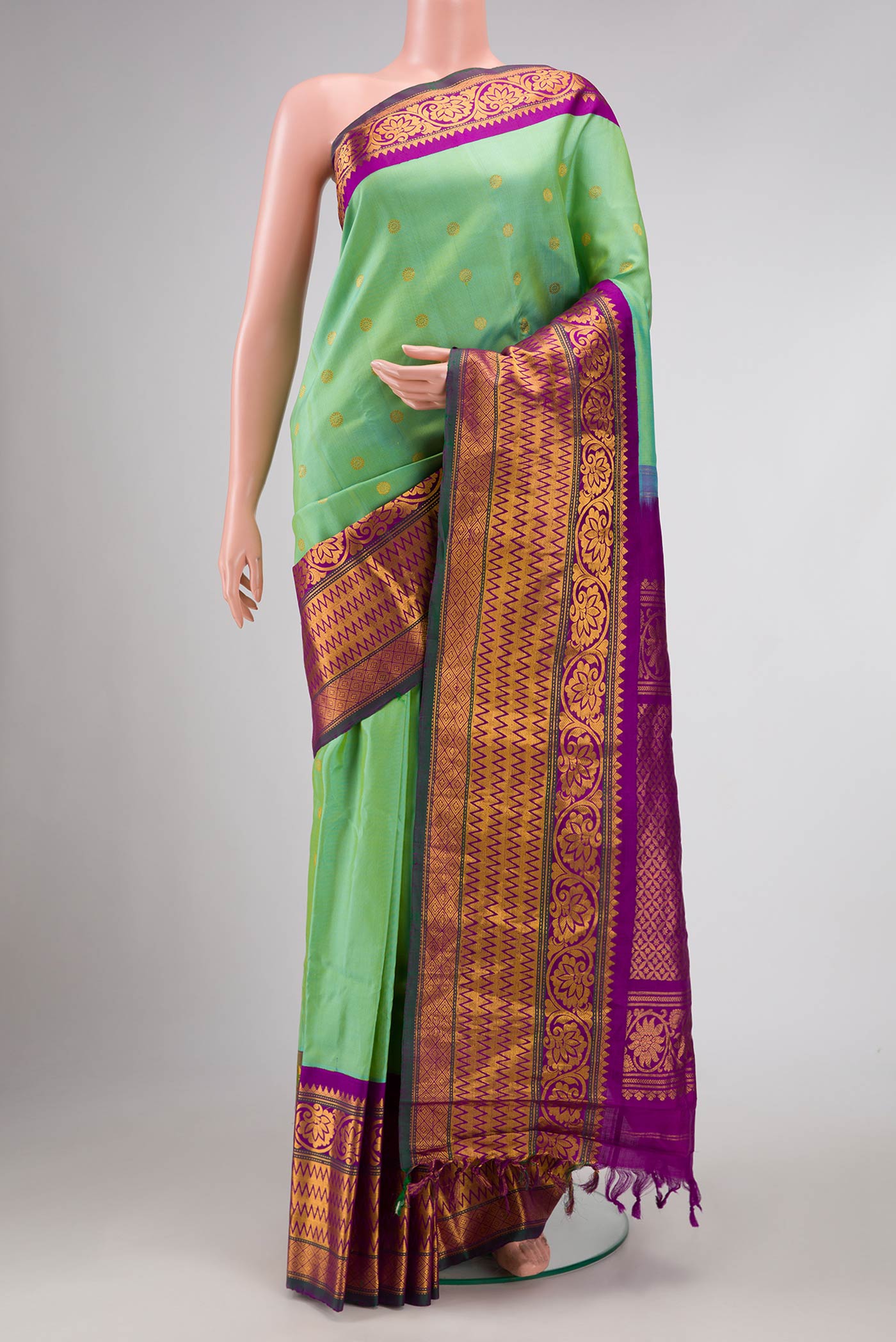 Sea Green Dual Tone Gadwal Silk Saree with Zari Butta on the body and Zari Border displayed on a mannequin