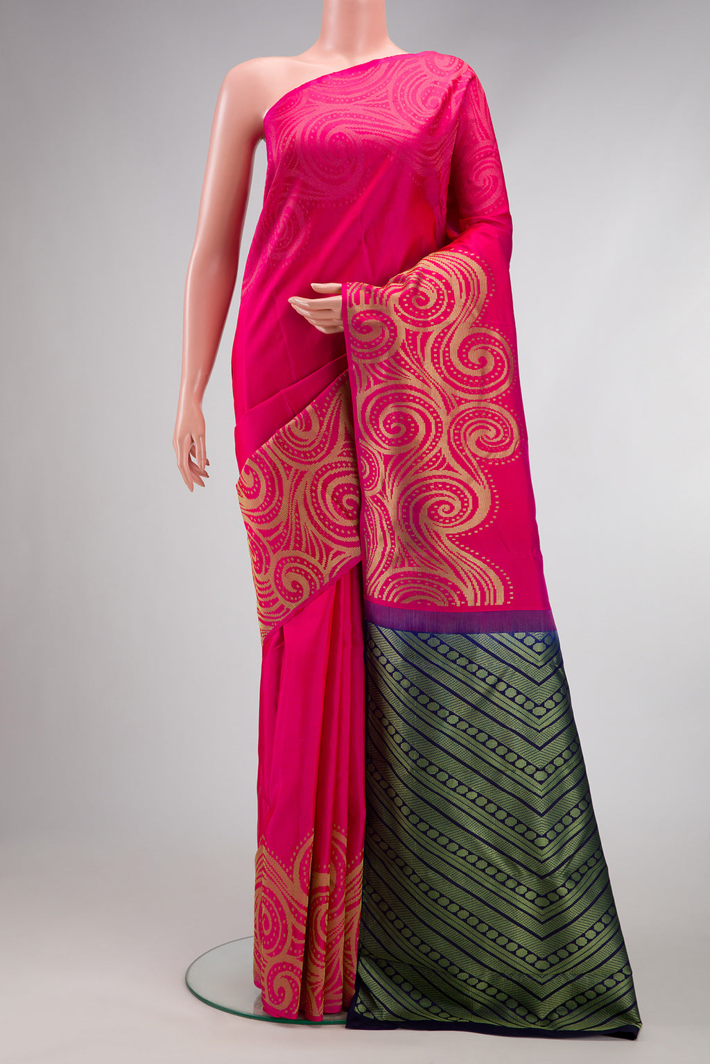 Pink Dual Tone Kanchipuram Silk Saree with Plain Body and Fancy Border.  displayed on a mannequin