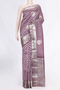 Burgundy Dual Tone Kanchipuram Silk Saree with Jacquard With Zari Butta on the body and Zari Border displayed on a mannequin