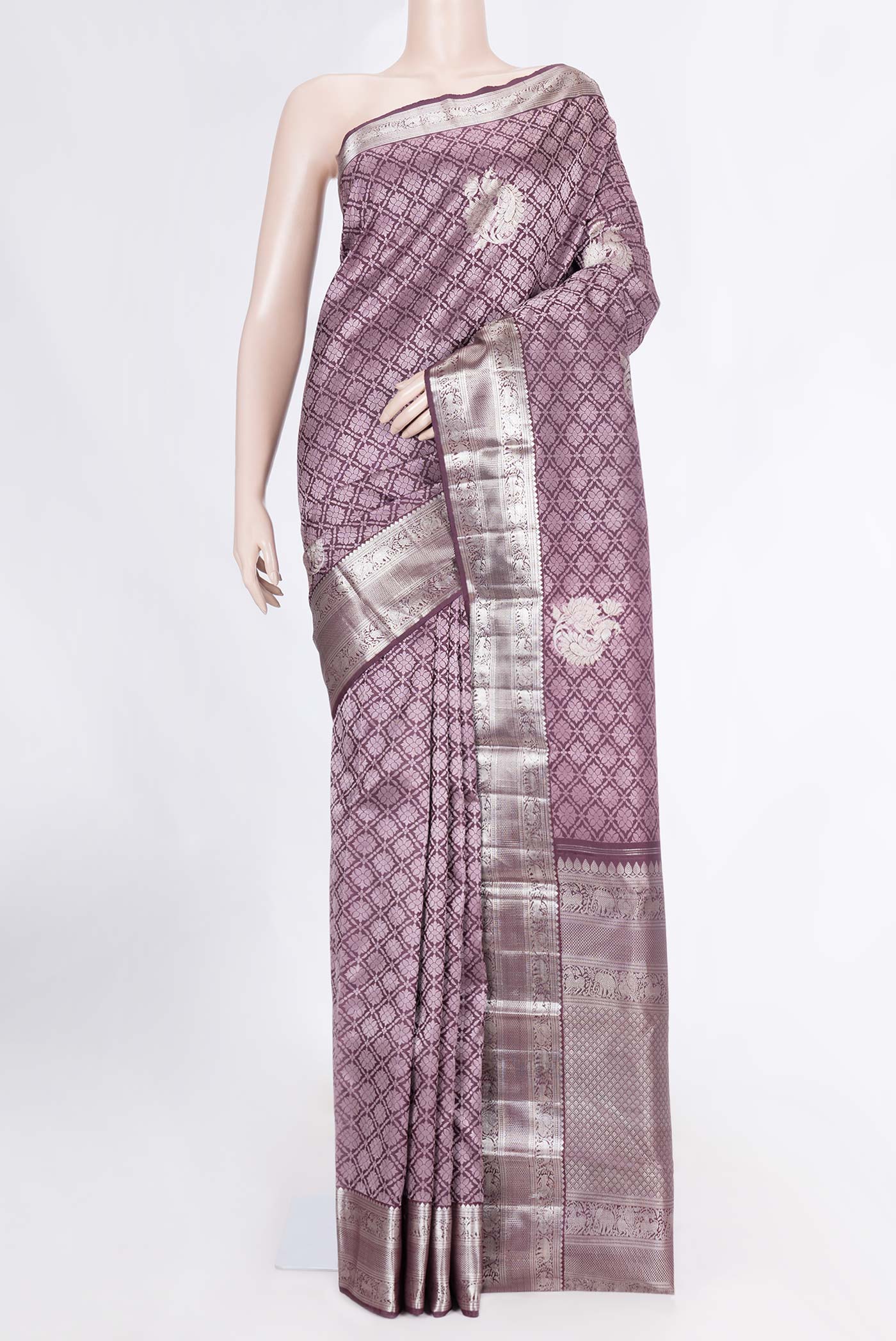 Burgundy Dual Tone Kanchipuram Silk Saree with Jacquard With Zari Butta on the body and Zari Border displayed on a mannequin