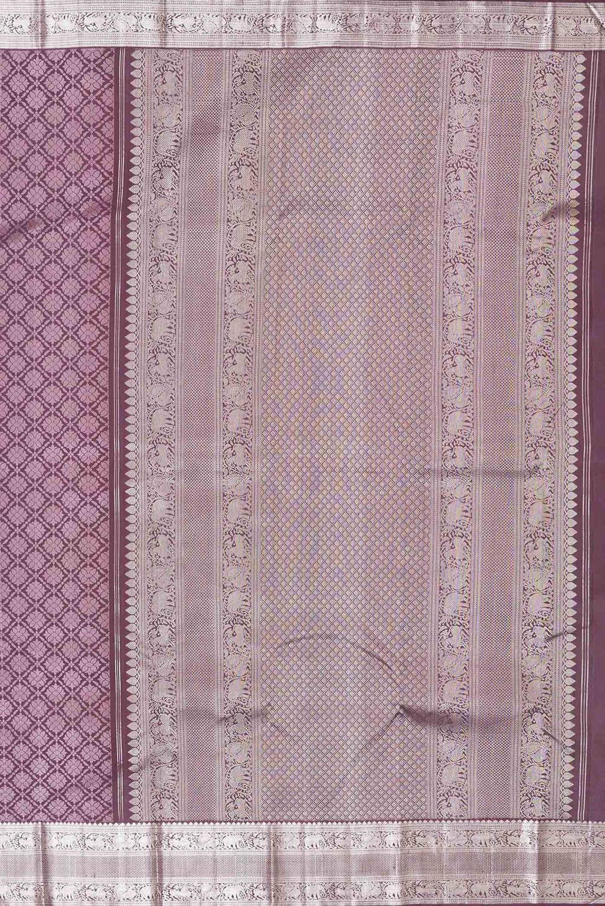 Close up image of the pallu of Burgundy Dual Tone Kanchipuram Silk Saree with Jacquard With Zari Butta on the body and Zari Border