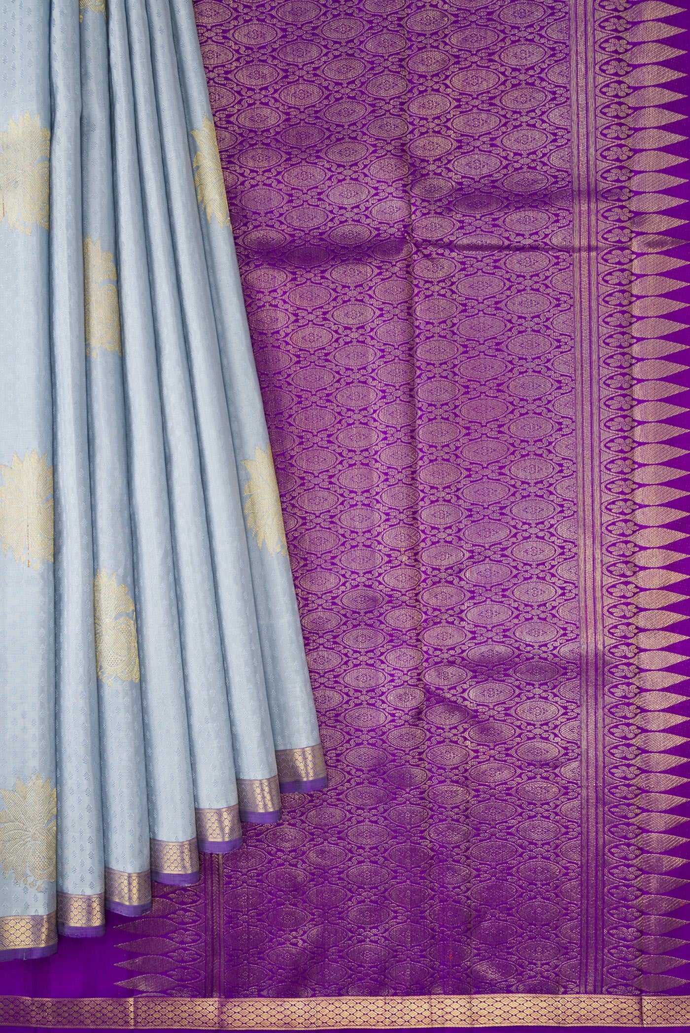 Pleats and pallu of Pure Silk Pure Zari Grey Dual Tone Kanjivaram Saree with Jacquard With Zari Butta on the body and Zari Border. 