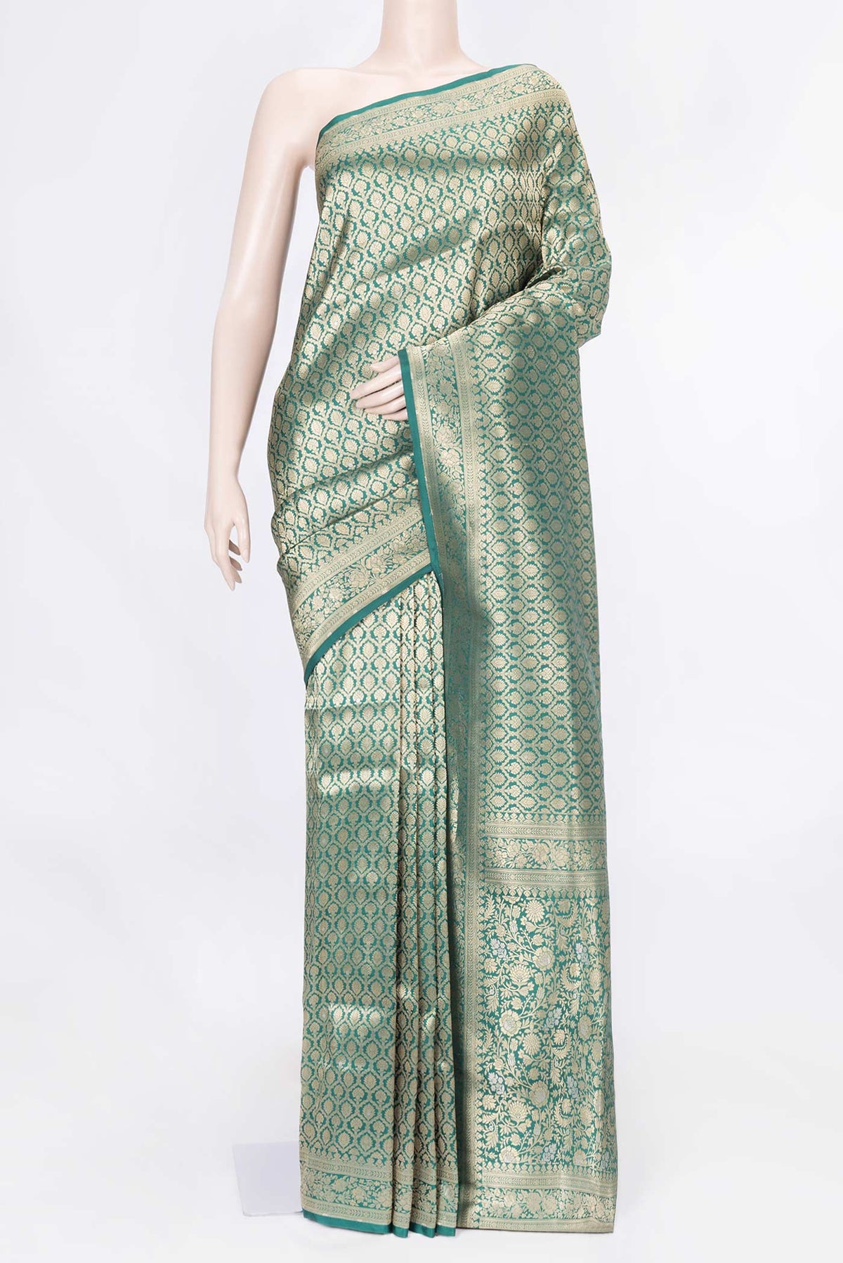 Green Dual Tone Banarasi Saree with Zari Brocade on the body and Zari Border displayed on a mannequin