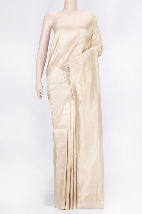 Beige Dual Tone Banarasi Saree with Zari Brocade on the body and Zari Border displayed on a mannequin