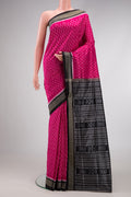 Pink Dual Tone Double Ikat Saree with Ikat Print on the body and Thread Border.  displayed on a mannequin