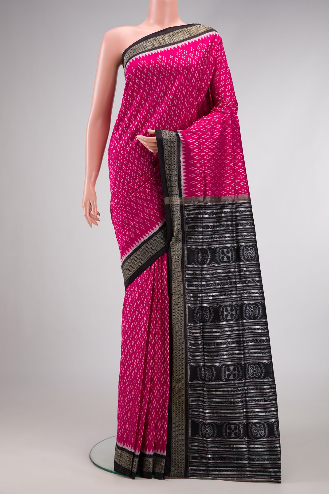 Pink Dual Tone Double Ikat Saree with Ikat Print on the body and Thread Border.  displayed on a mannequin