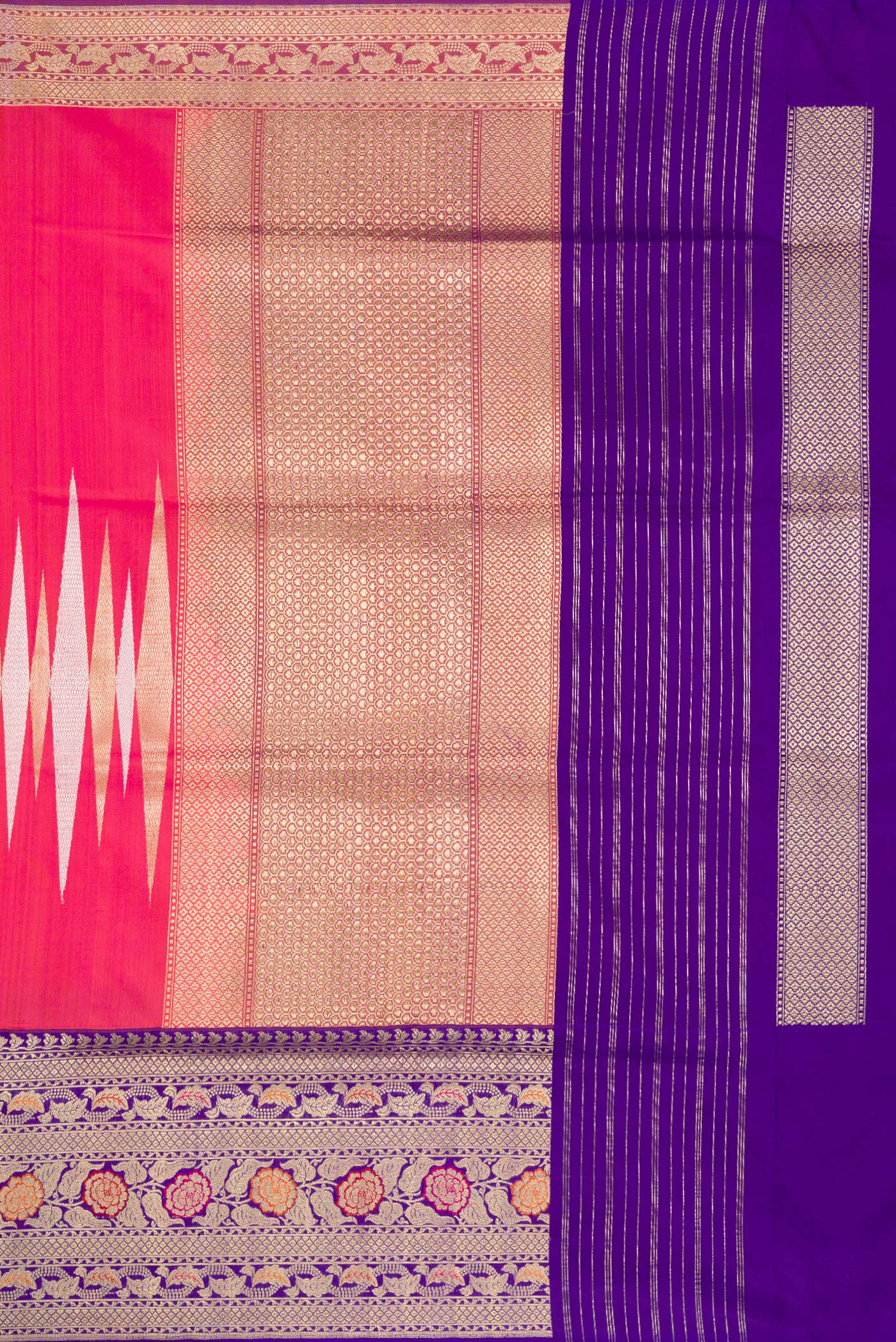 Close up image of the pallu of Coral Dual Tone Banarasi Silk Saree with Zari Butta on the body and Zari Border. 