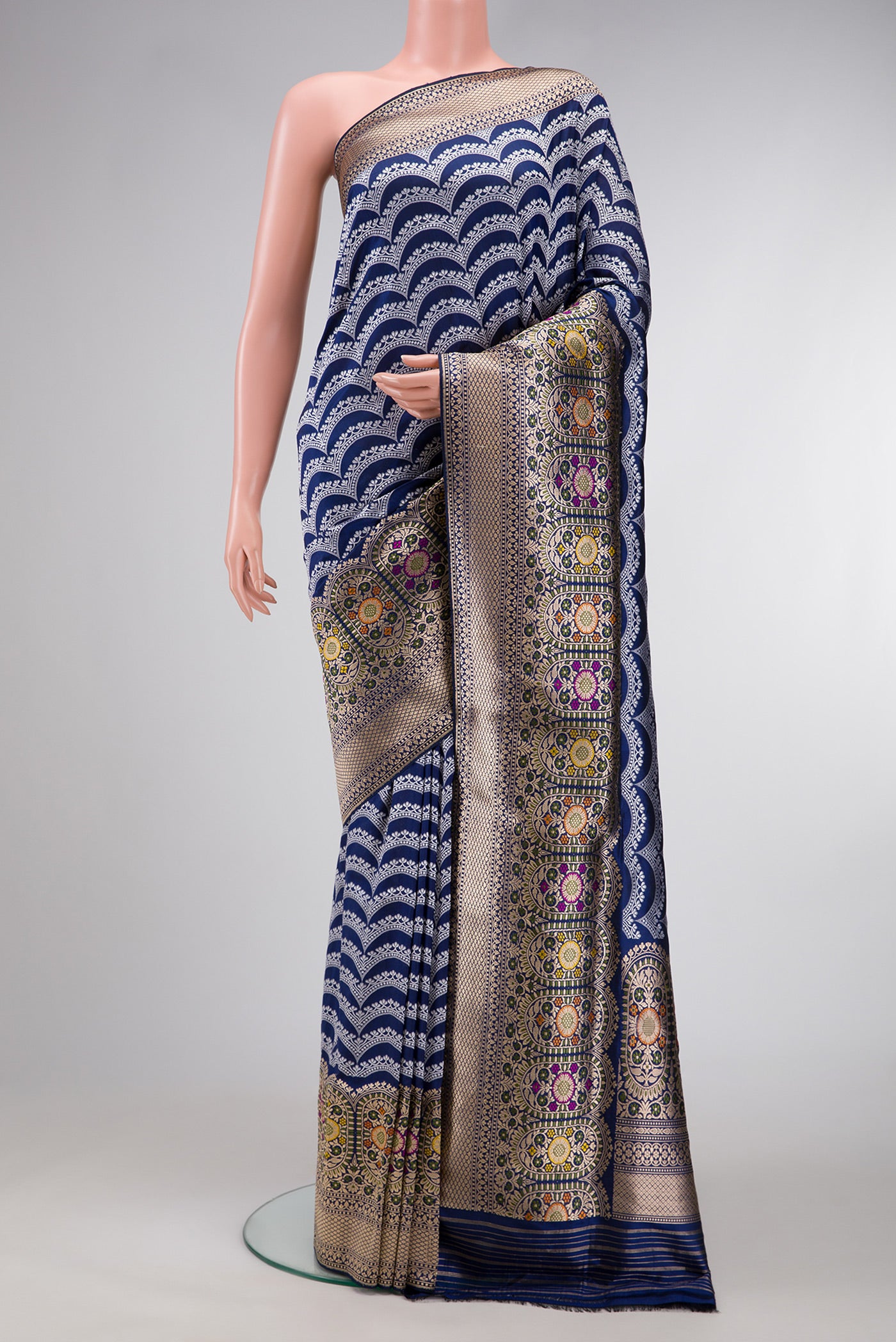 Navy Blue Dual Tone Banarasi Silk Saree with Stripes on the body and Zari Border.  displayed on a mannequin