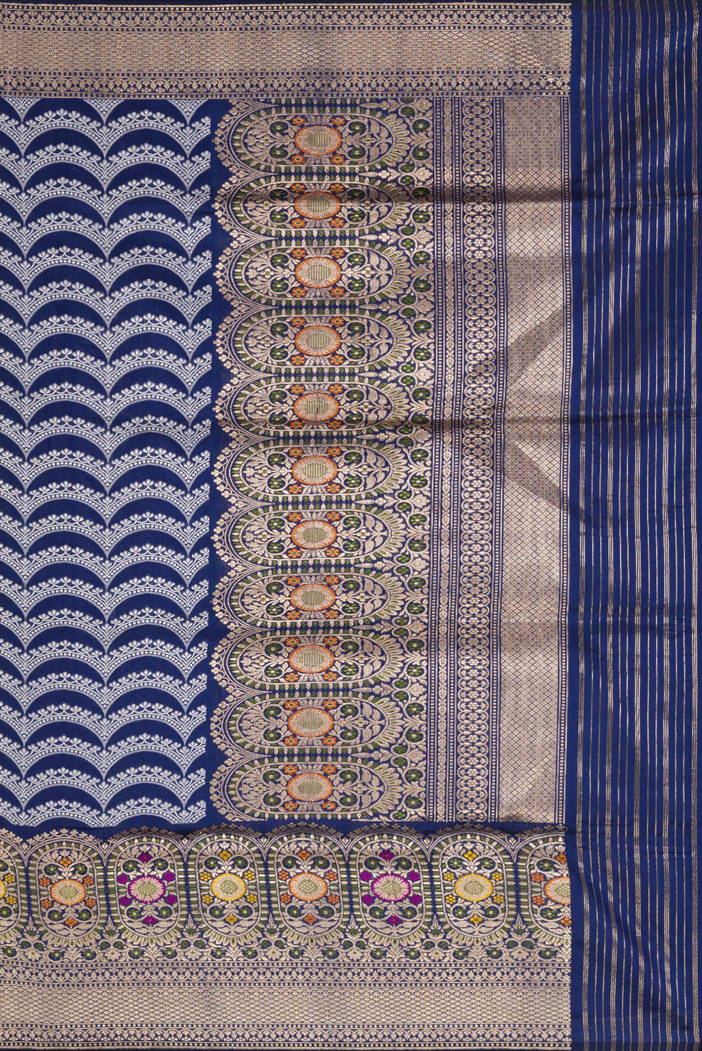 Close up image of the pallu of Navy Blue Dual Tone Banarasi Silk Saree with Stripes on the body and Zari Border. 