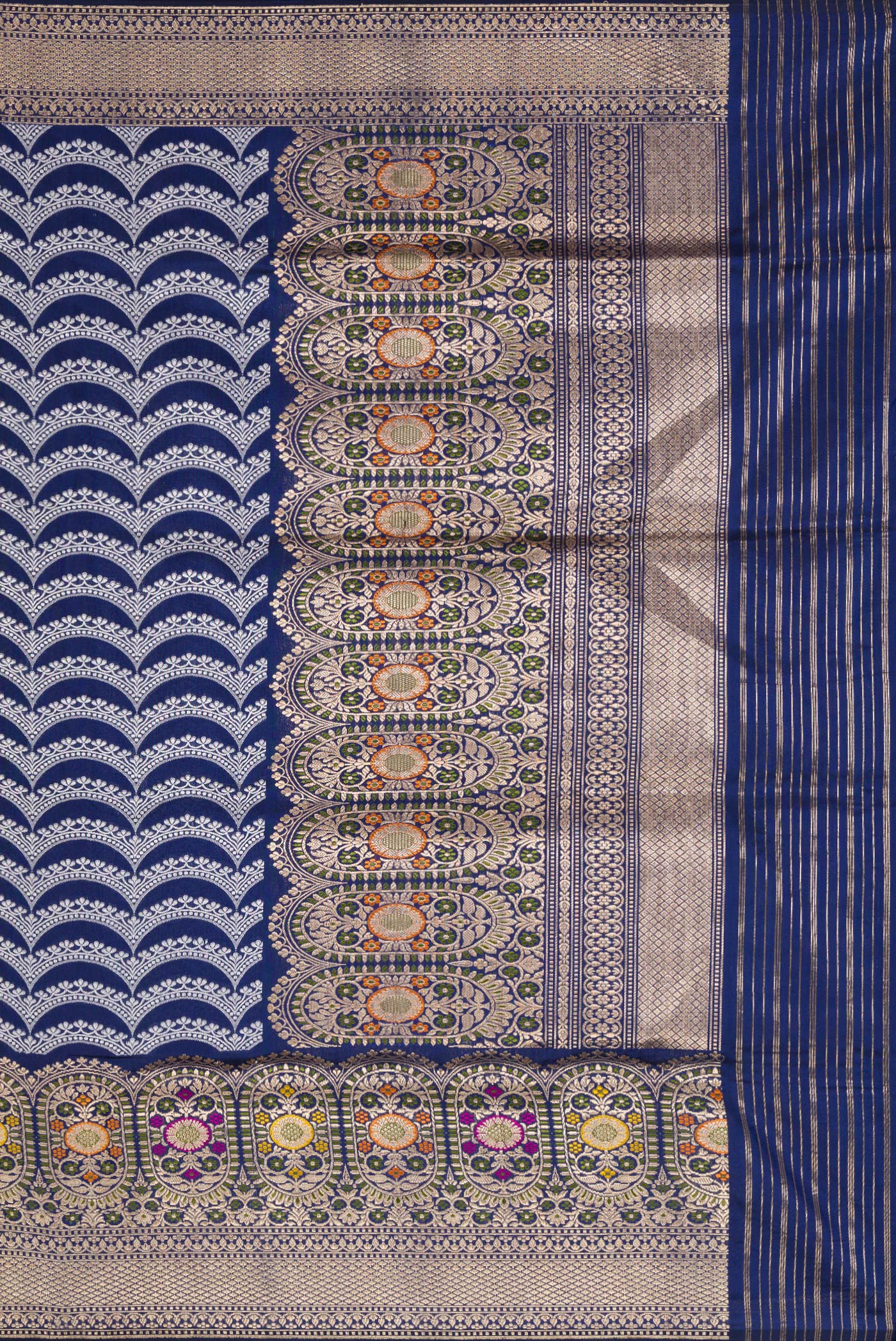 Close up image of the pallu of Navy Blue Dual Tone Banarasi Silk Saree with Stripes on the body and Zari Border. 