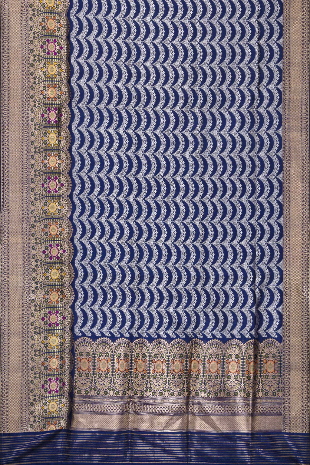 Flat view of Navy Blue Dual Tone Banarasi Silk Saree with Stripes on the body and Zari Border. 
