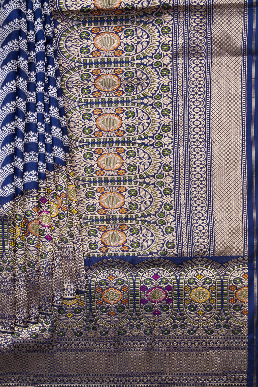Pleats and pallu of Navy Blue Dual Tone Banarasi Silk Saree with Stripes on the body and Zari Border. 