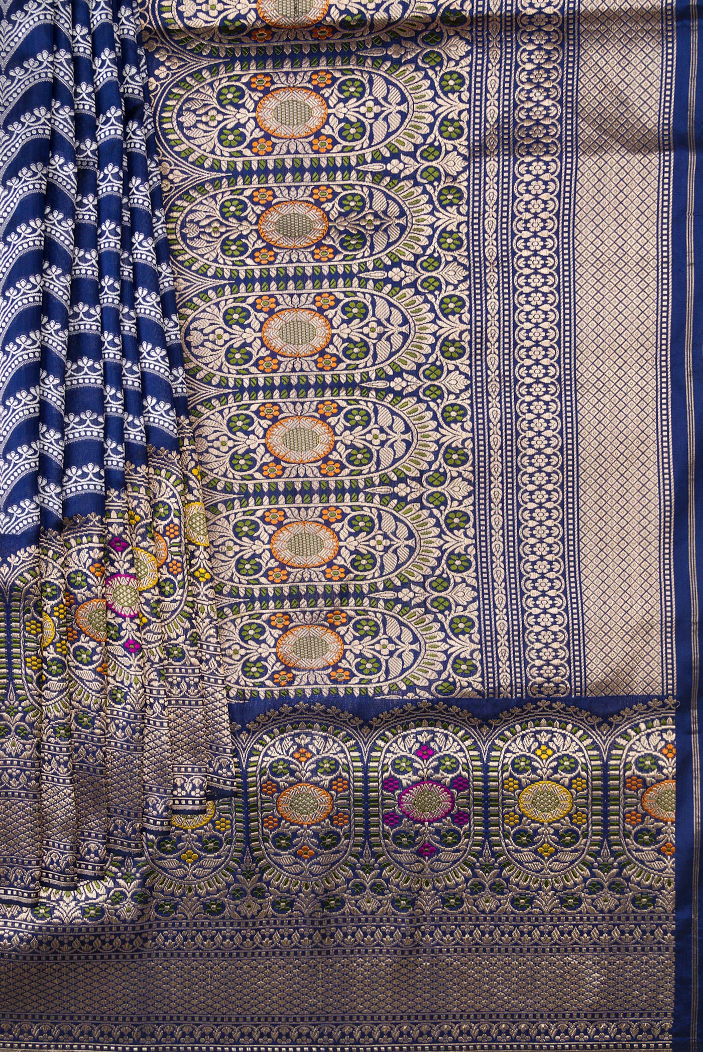 Pleats and pallu of Navy Blue Dual Tone Banarasi Silk Saree with Stripes on the body and Zari Border. 