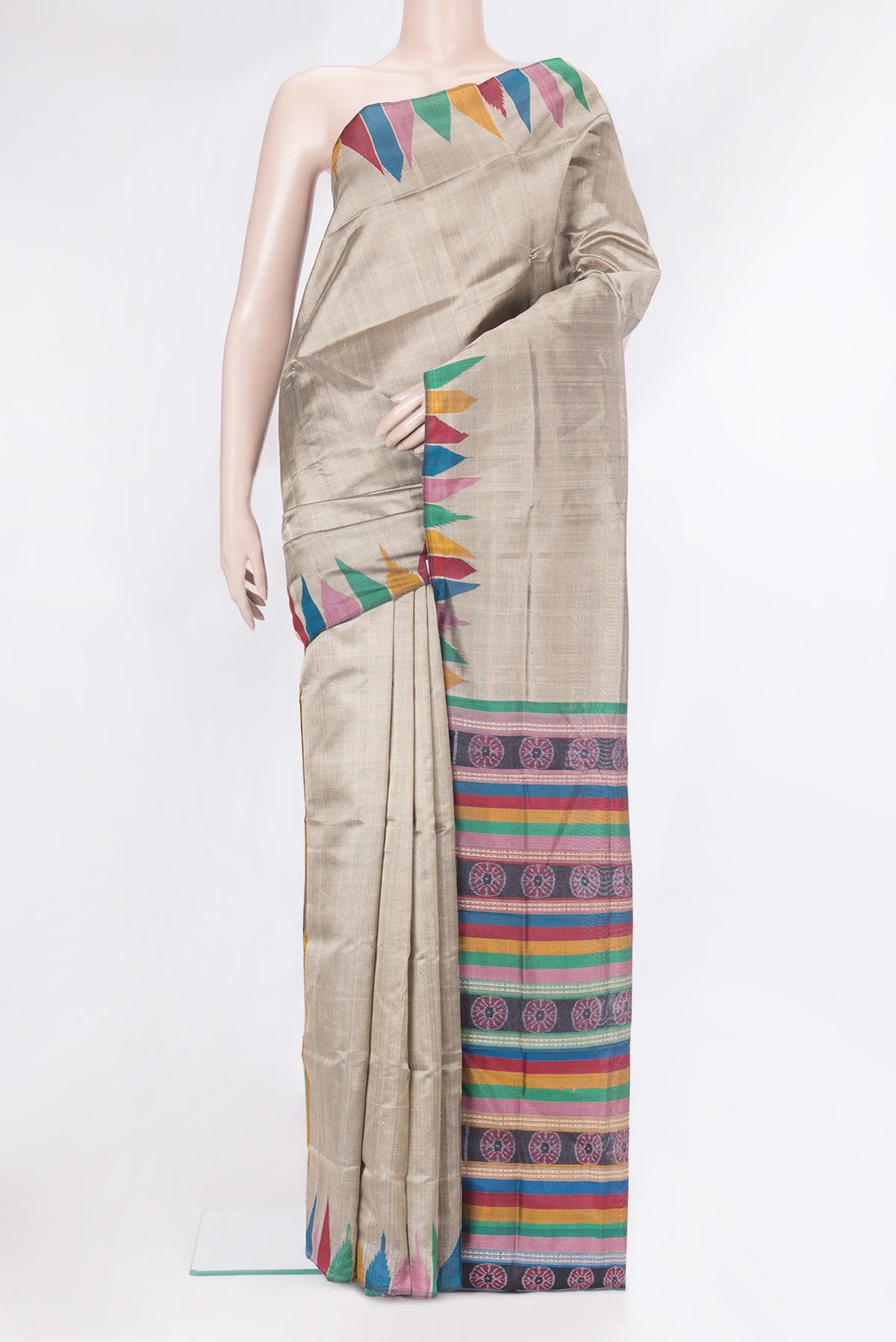 Grey Double Ikat Saree with Plain Body and Temple Border.  displayed on a mannequin