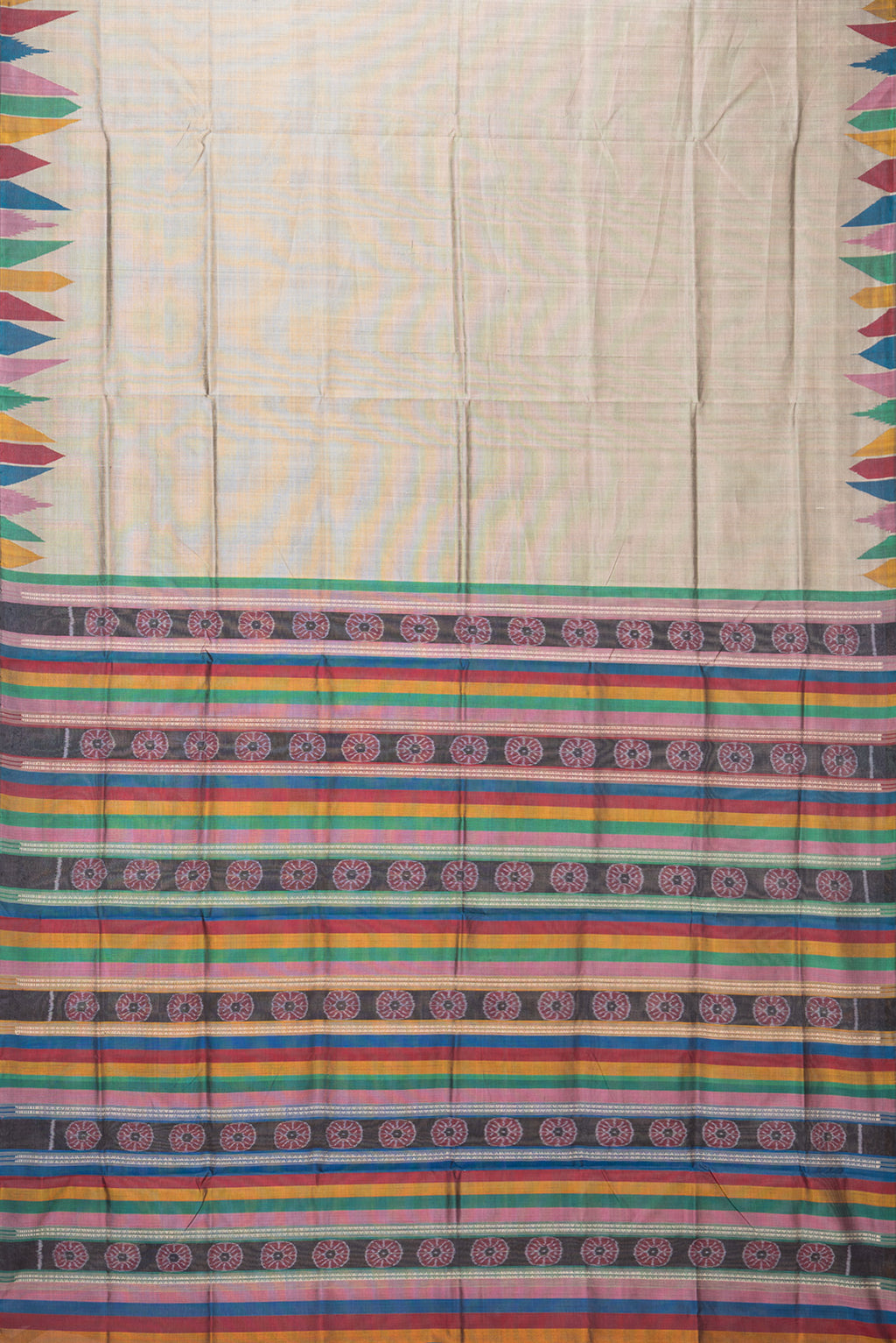 Flat view of Grey Double Ikat Saree with Plain Body and Temple Border. 