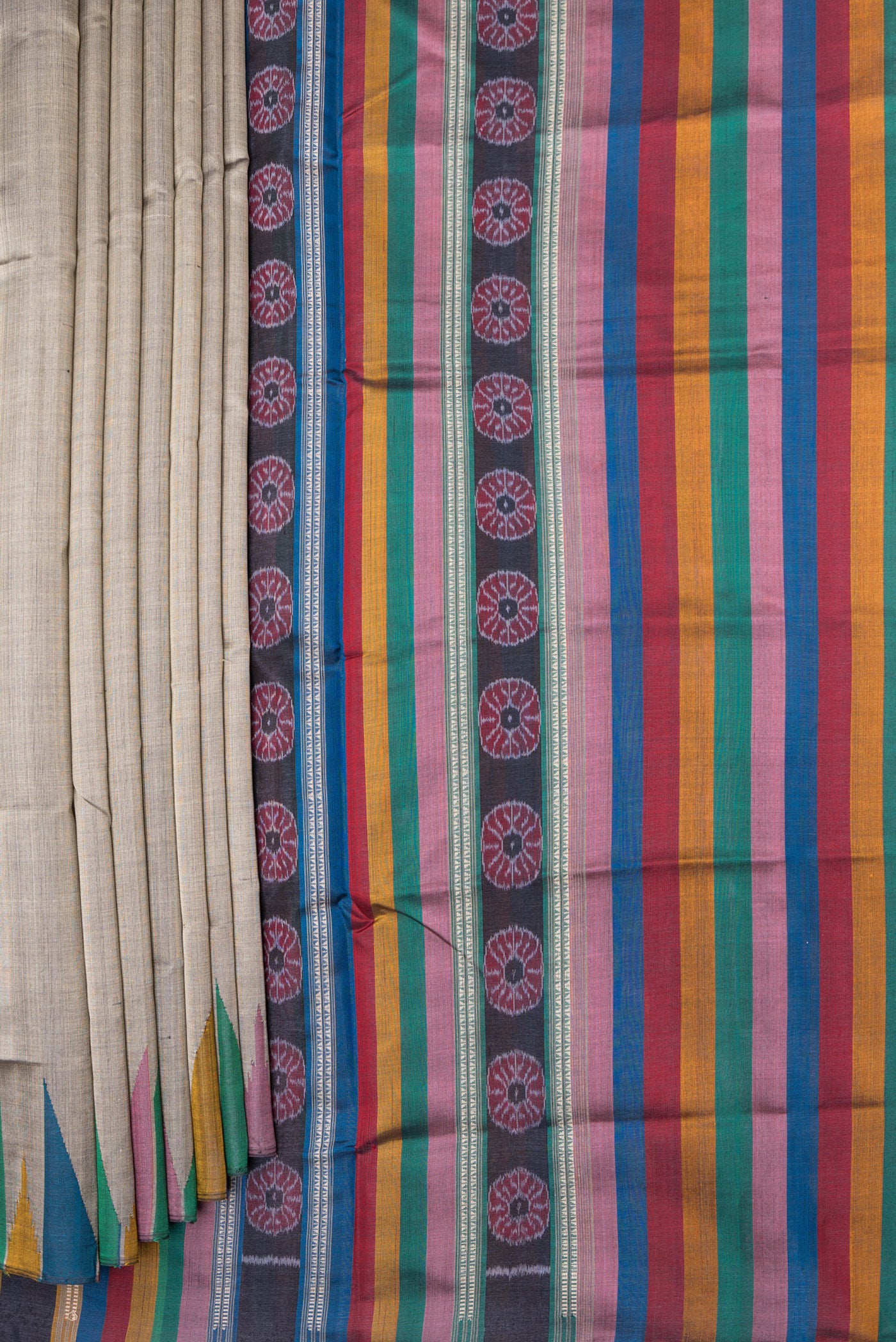 Pleats and pallu of Grey Double Ikat Saree with Plain Body and Temple Border. 