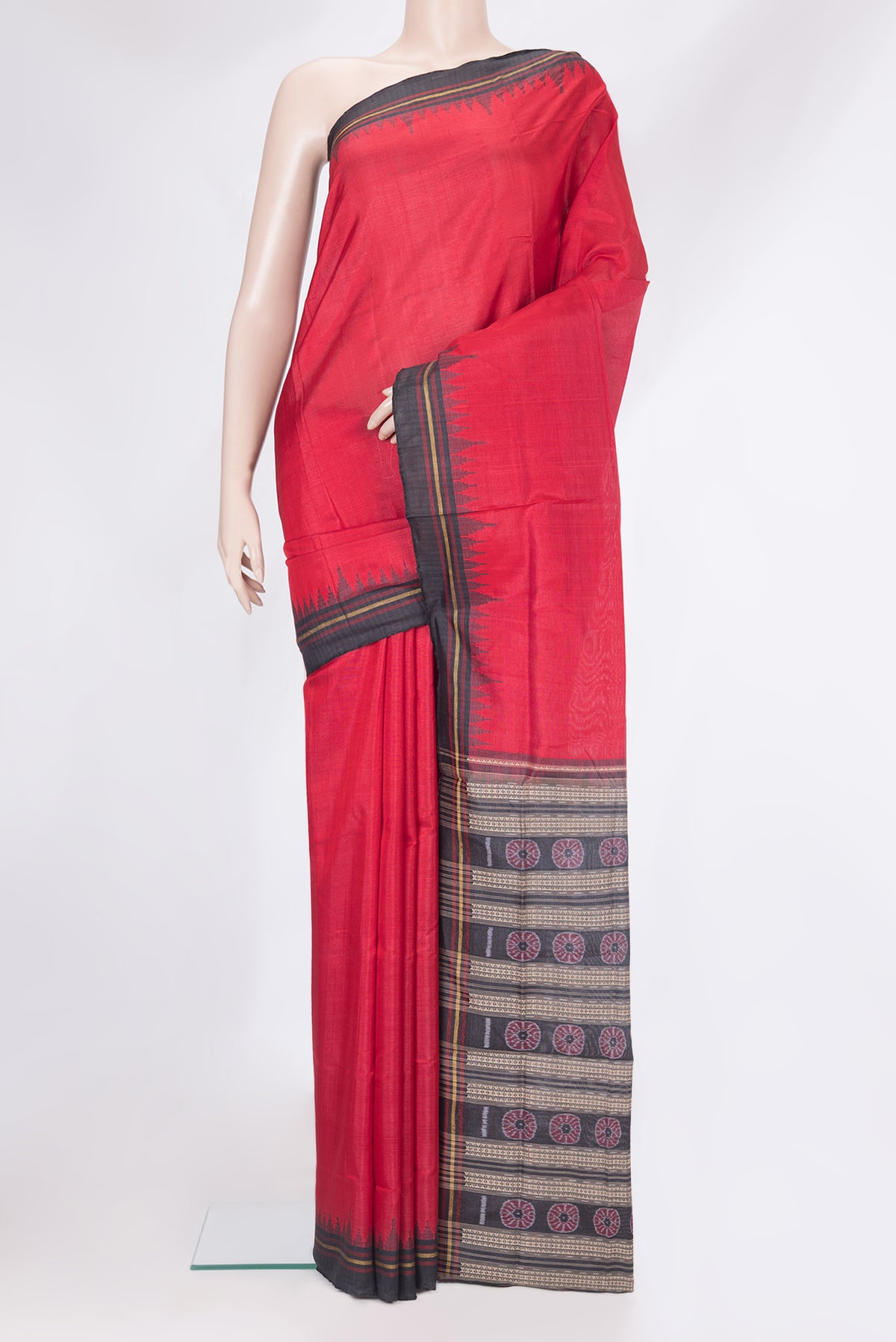 Red Double Ikat Saree with Plain Body and Temple Border.  displayed on a mannequin