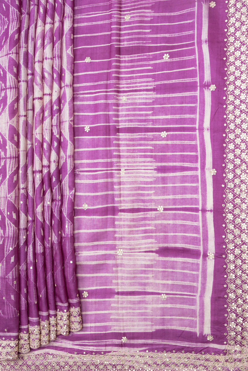 Pleats and pallu of Purple Dual Tone Tussar Silk Saree with Embroidery on the body and Embroidery Border. 