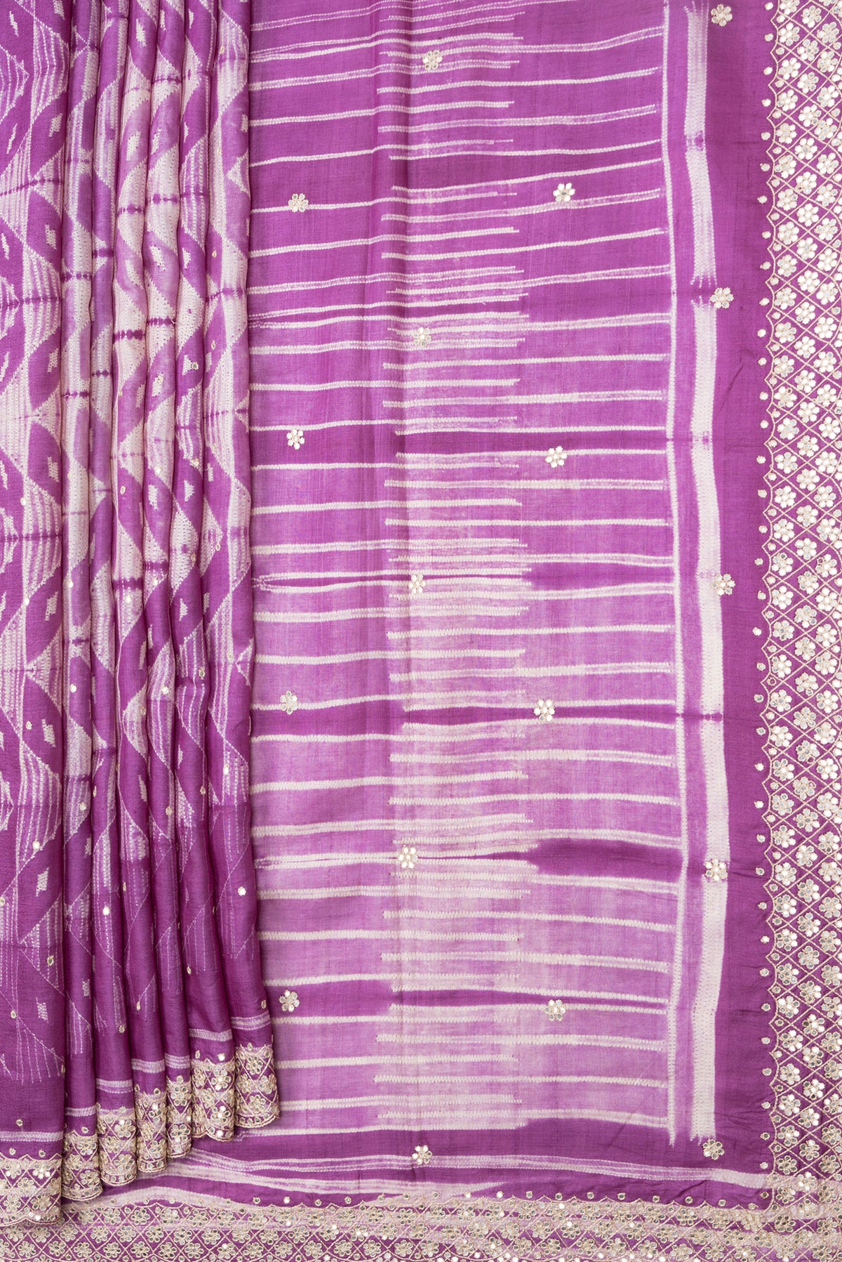 Pleats and pallu of Purple Dual Tone Tussar Silk Saree with Embroidery on the body and Embroidery Border. 