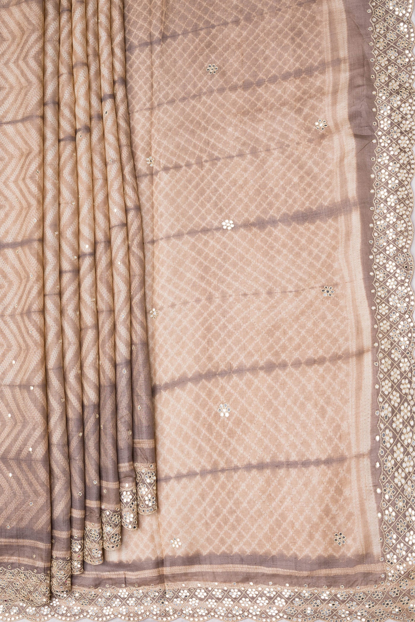 Pleats and pallu of Golden Peach Dual Tone Tussar Silk Saree with Embroidery on the body and Embroidery Border. 