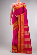 Pure Silk Pure Zari Dark Pink Kanjivaram Saree with Stripes on the body and Fancy Border.  displayed on a mannequin