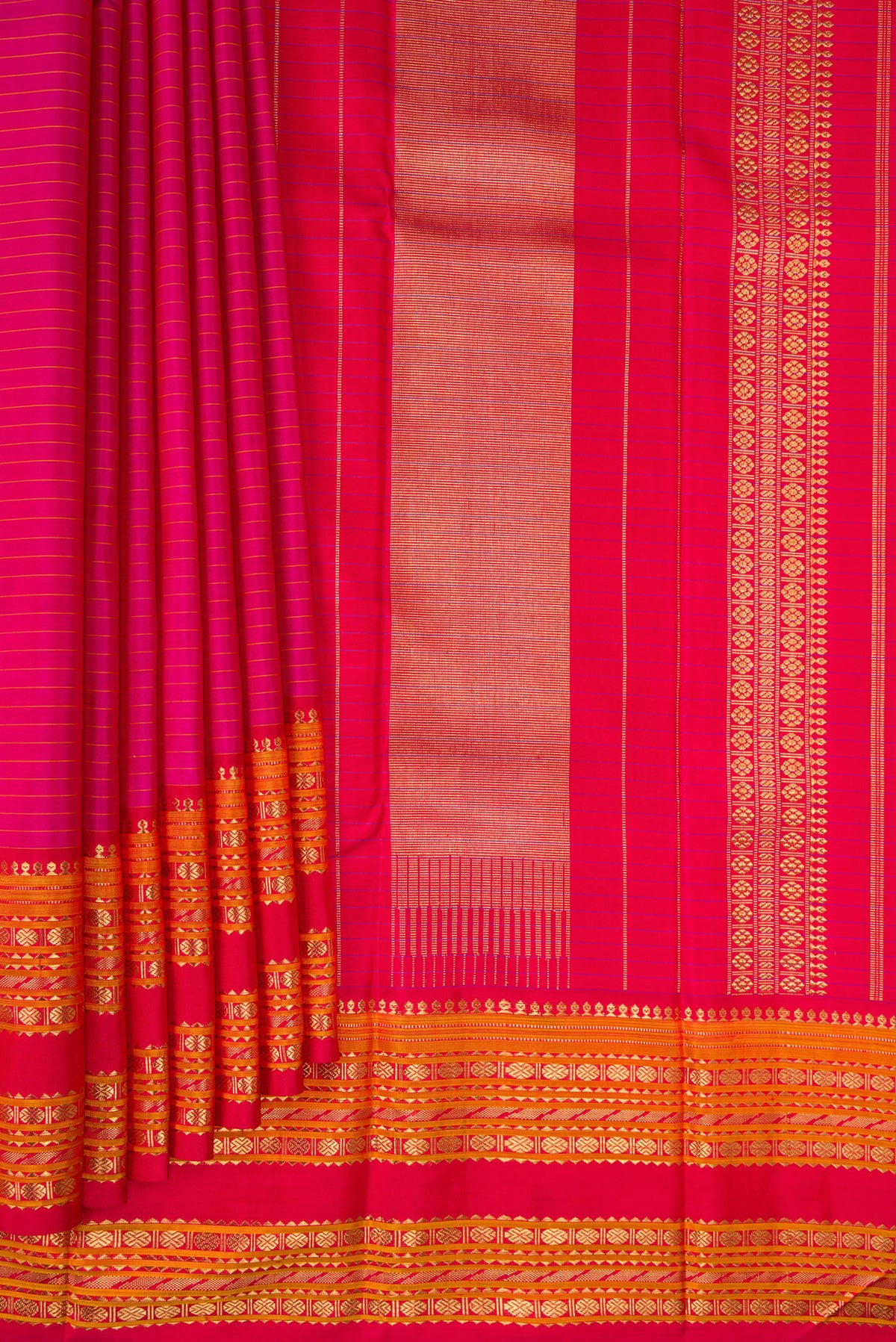 Pleats and pallu of Pure Silk Pure Zari Dark Pink Kanjivaram Saree with Stripes on the body and Fancy Border. 