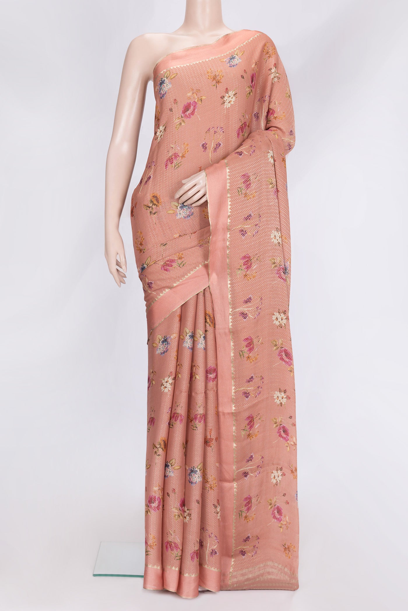 Peach Dual Tone Georgette Saree with Zari Brocade on the body and Zari Border.  displayed on a mannequin